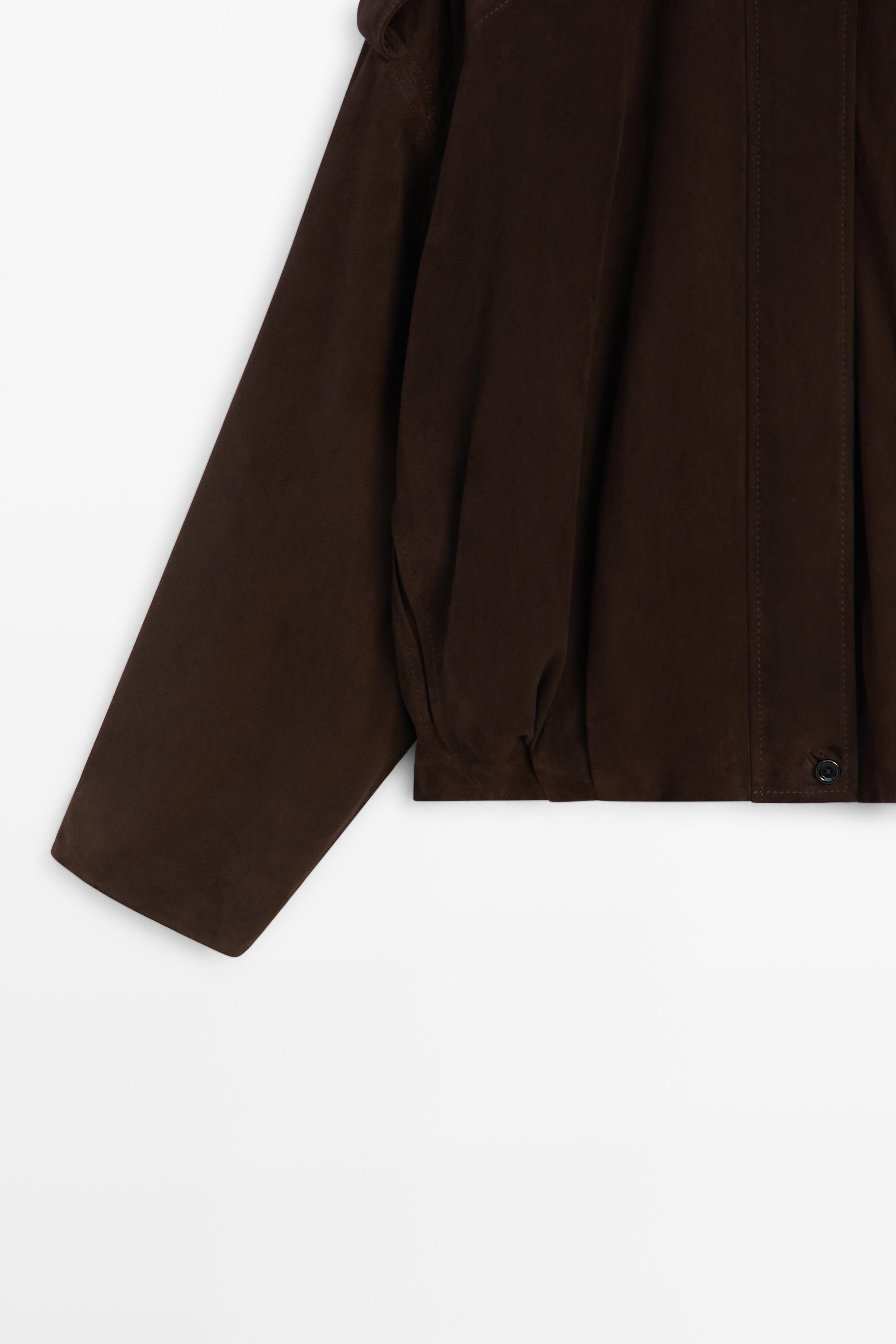 Blouson bomber avec détail de plis en cuir et daim