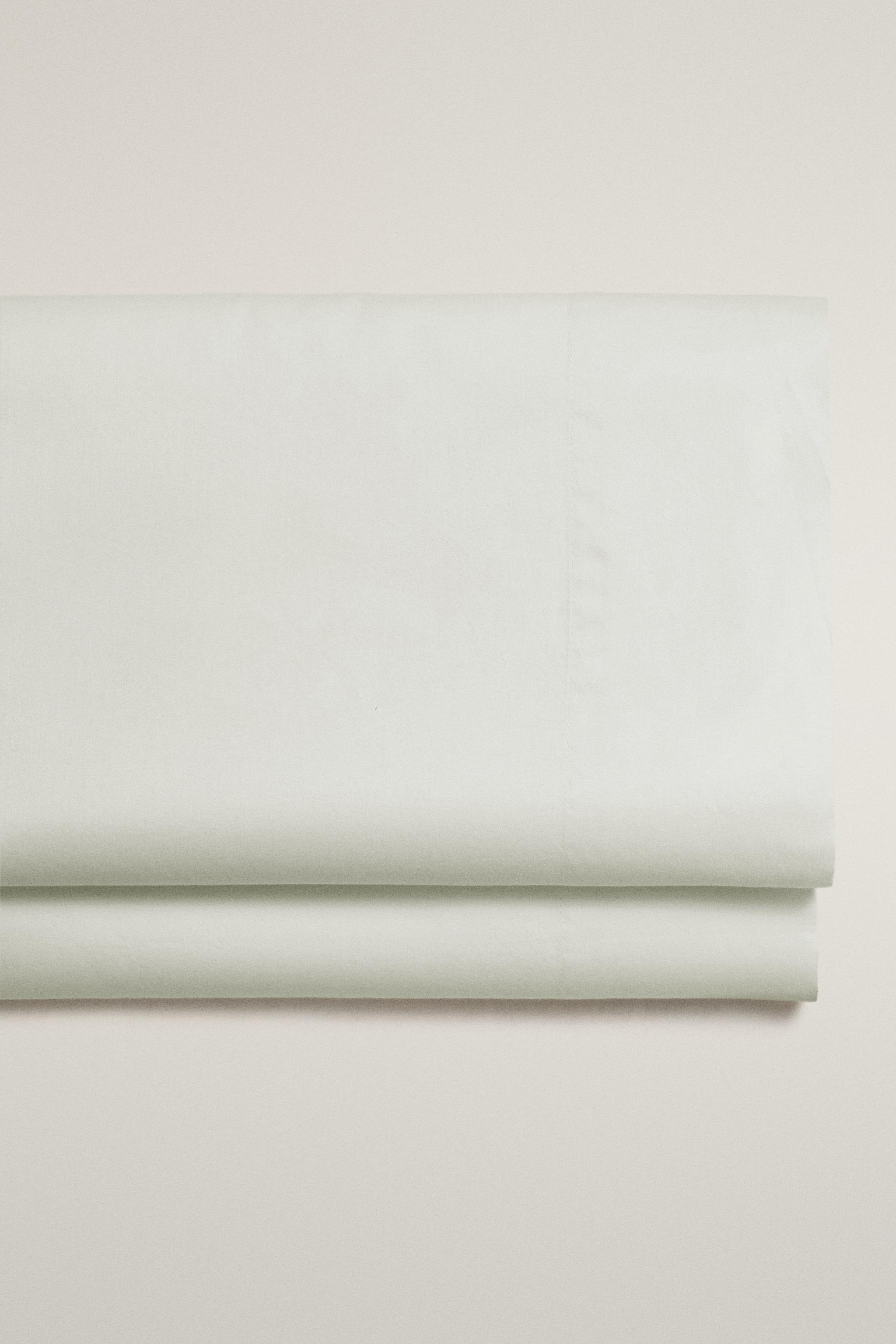 FADED-EFFECT SATEEN FLAT SHEET (300 THREAD COUNT) — Ice