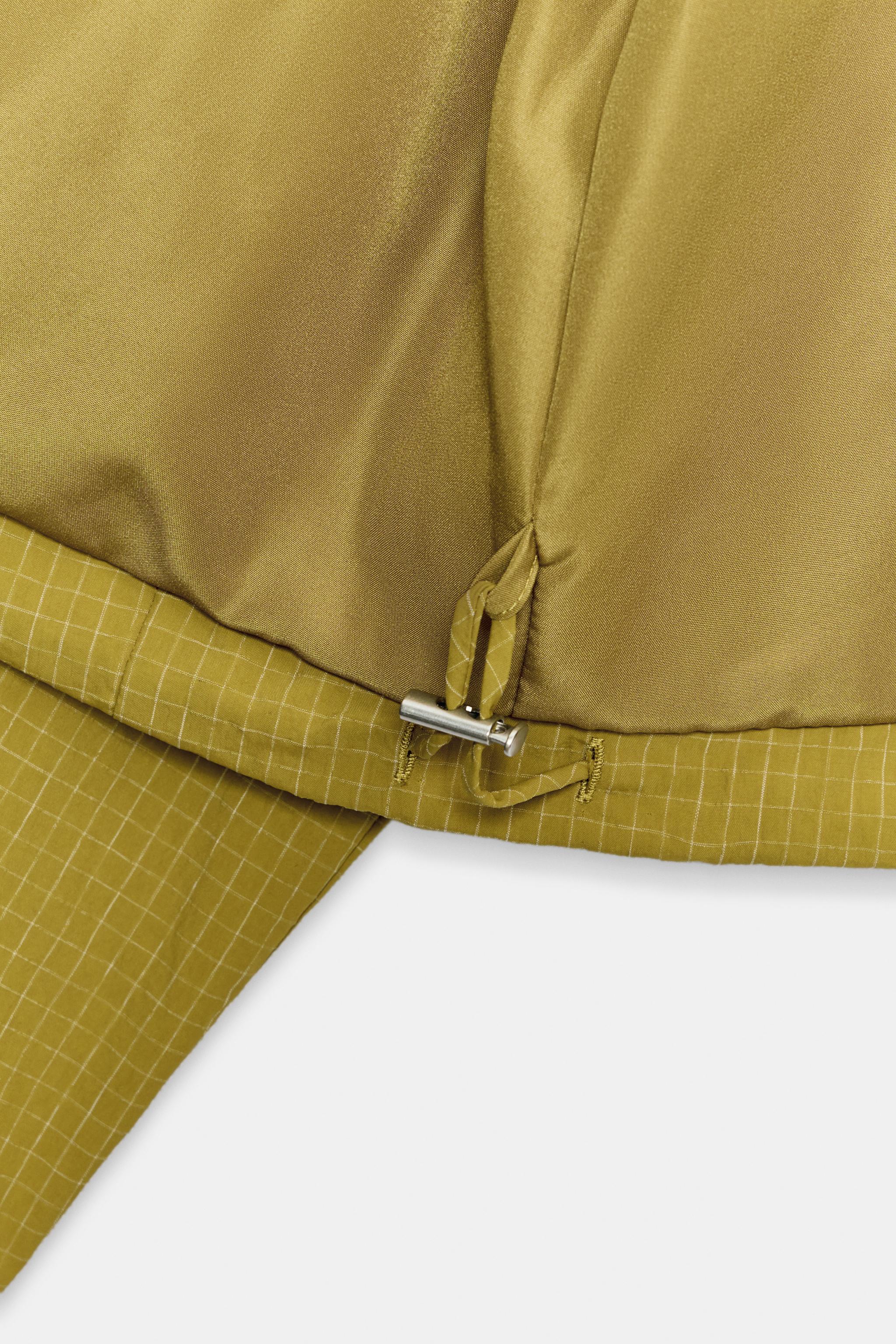 VESTE PLIS TISSU TECHNIQUE