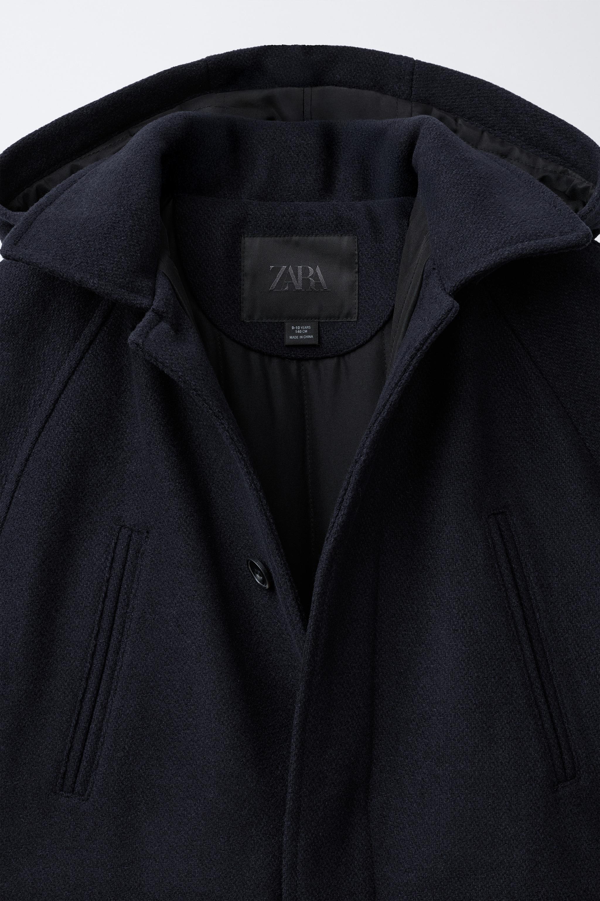 MANTEAU EN DRAP À CAPUCHE