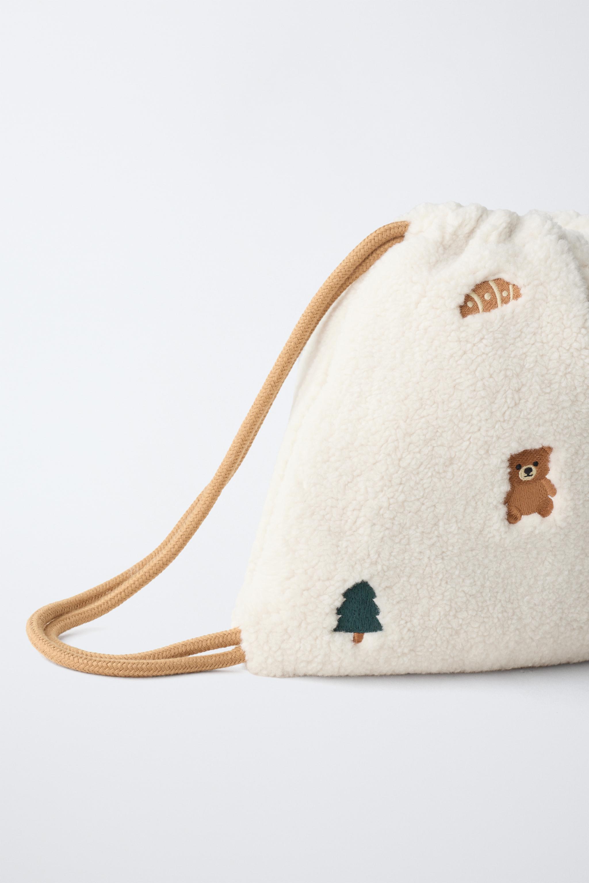 EMBROIDERED FLEECE BAG