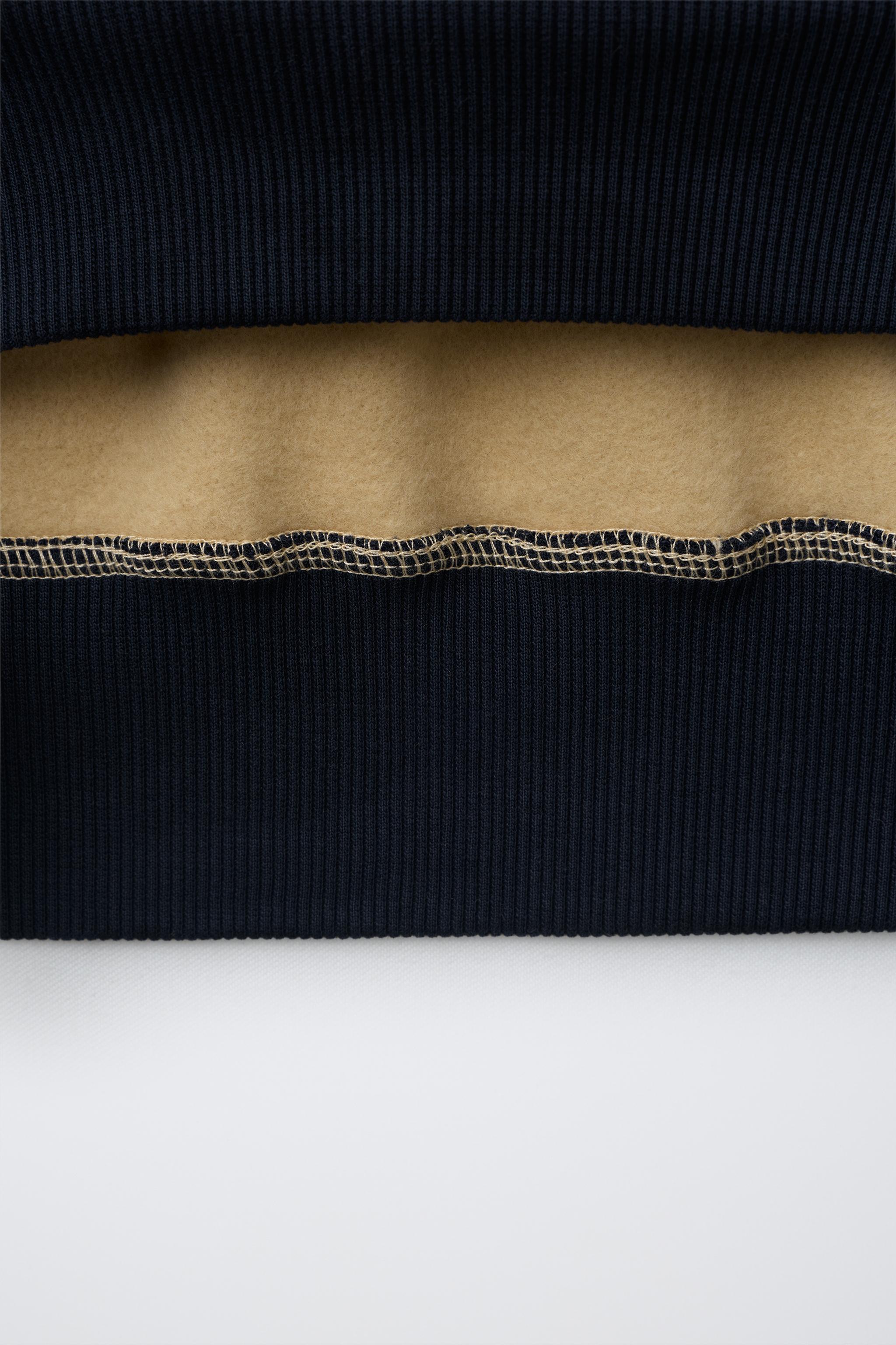 STRIPED NUMBER PATCH SWEATSHIRT