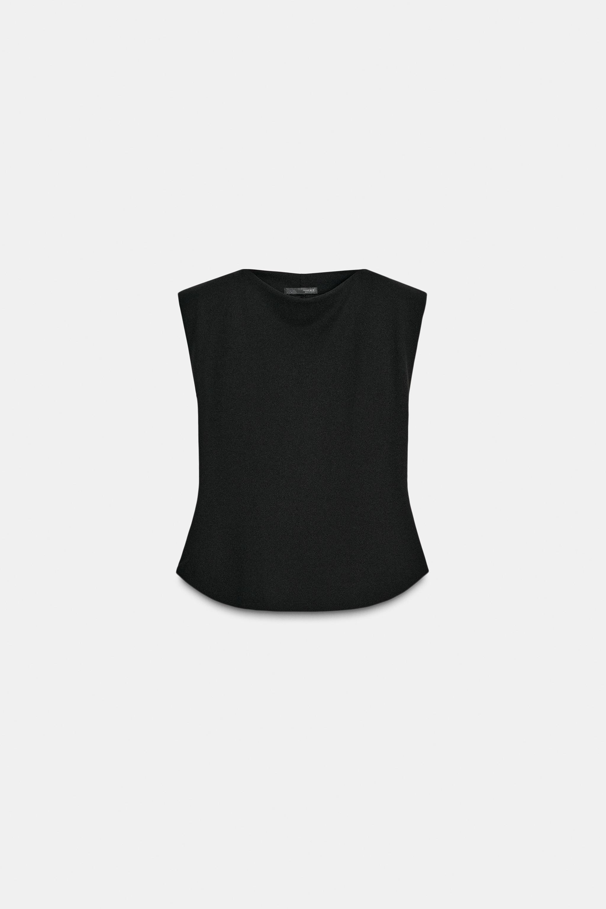 CREPE PEPLUM SHOULDER PAD TOP