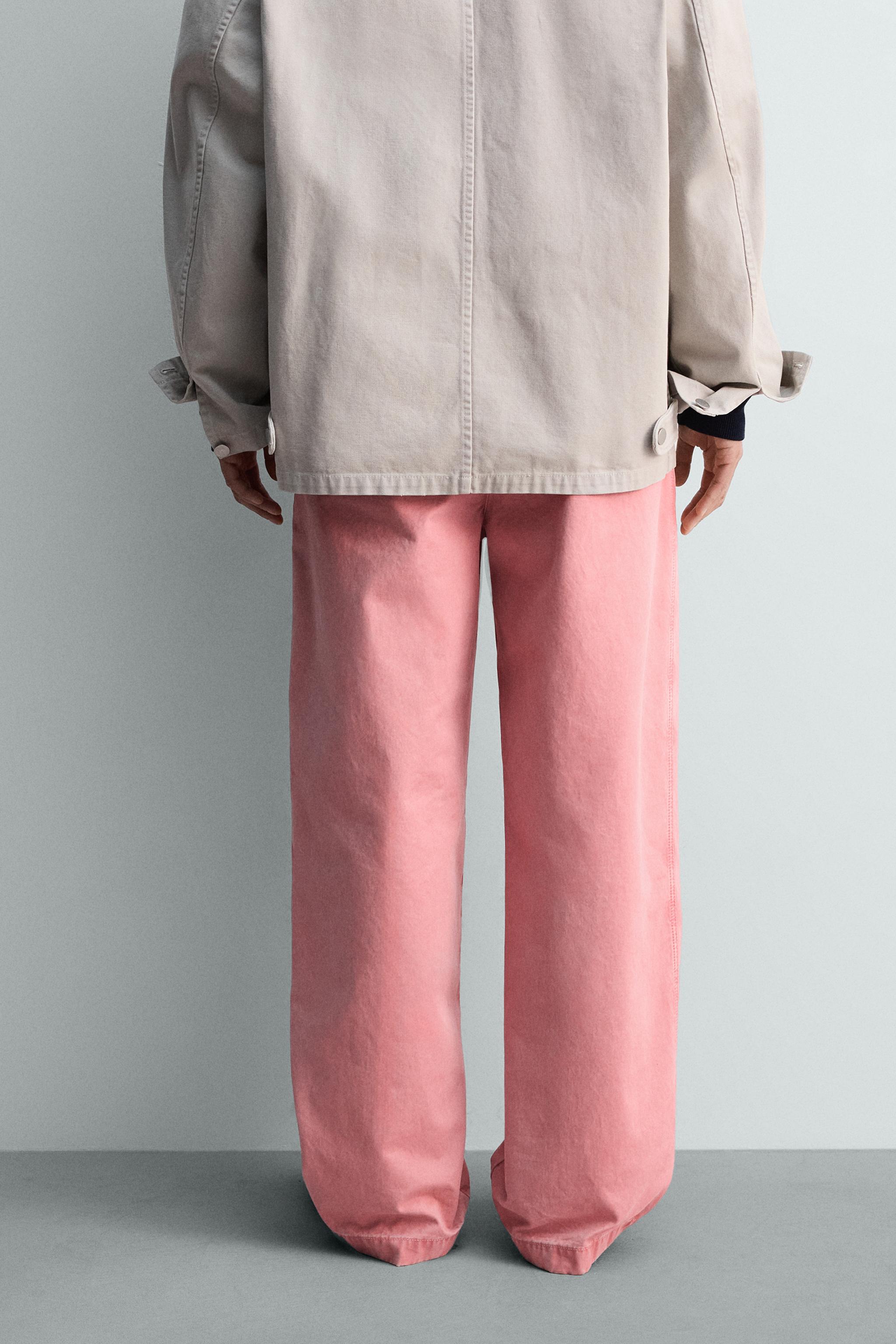 RELAXED FIT PLEATED PANTS