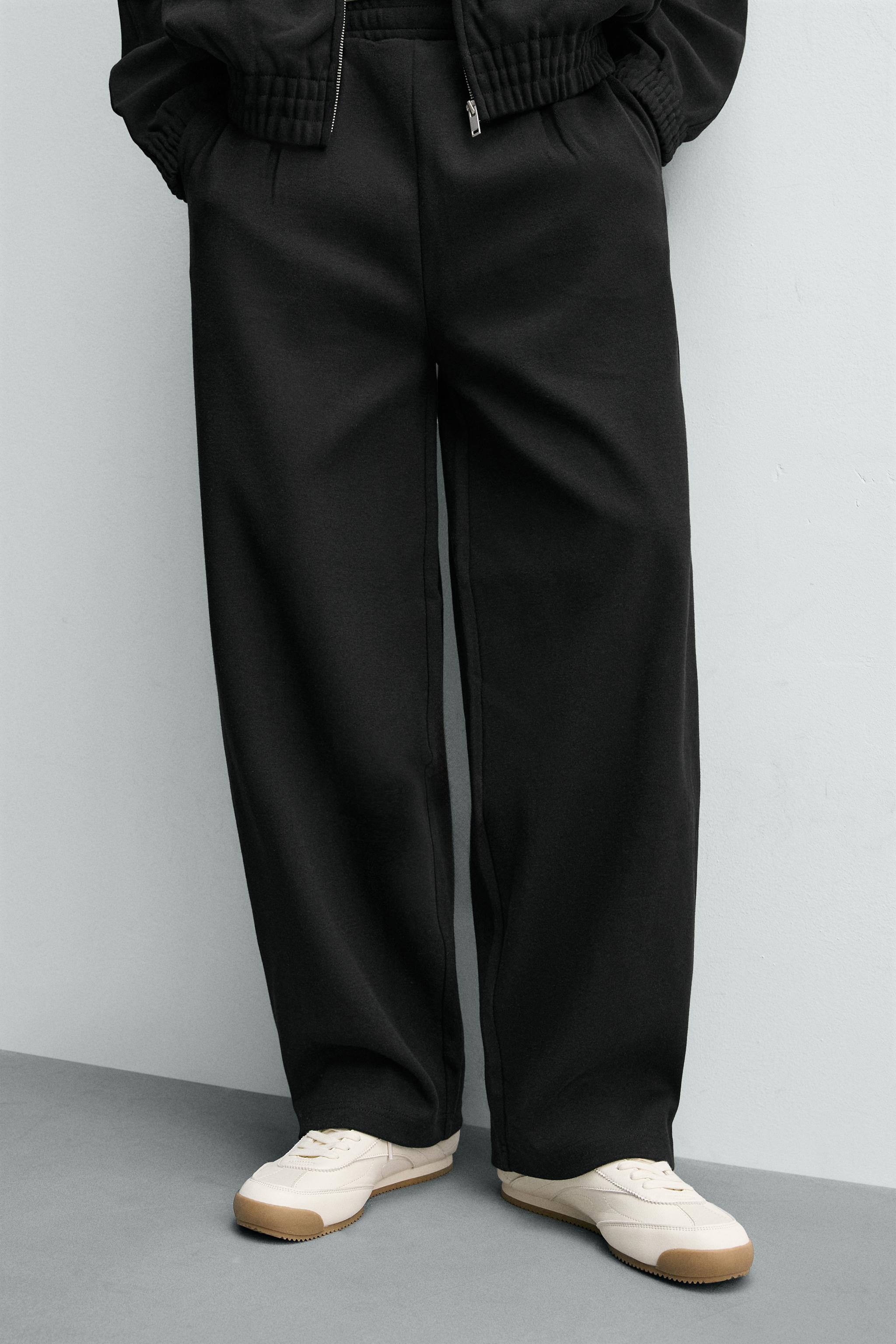 PLEATED WIDE FIT JOGGER PANTS