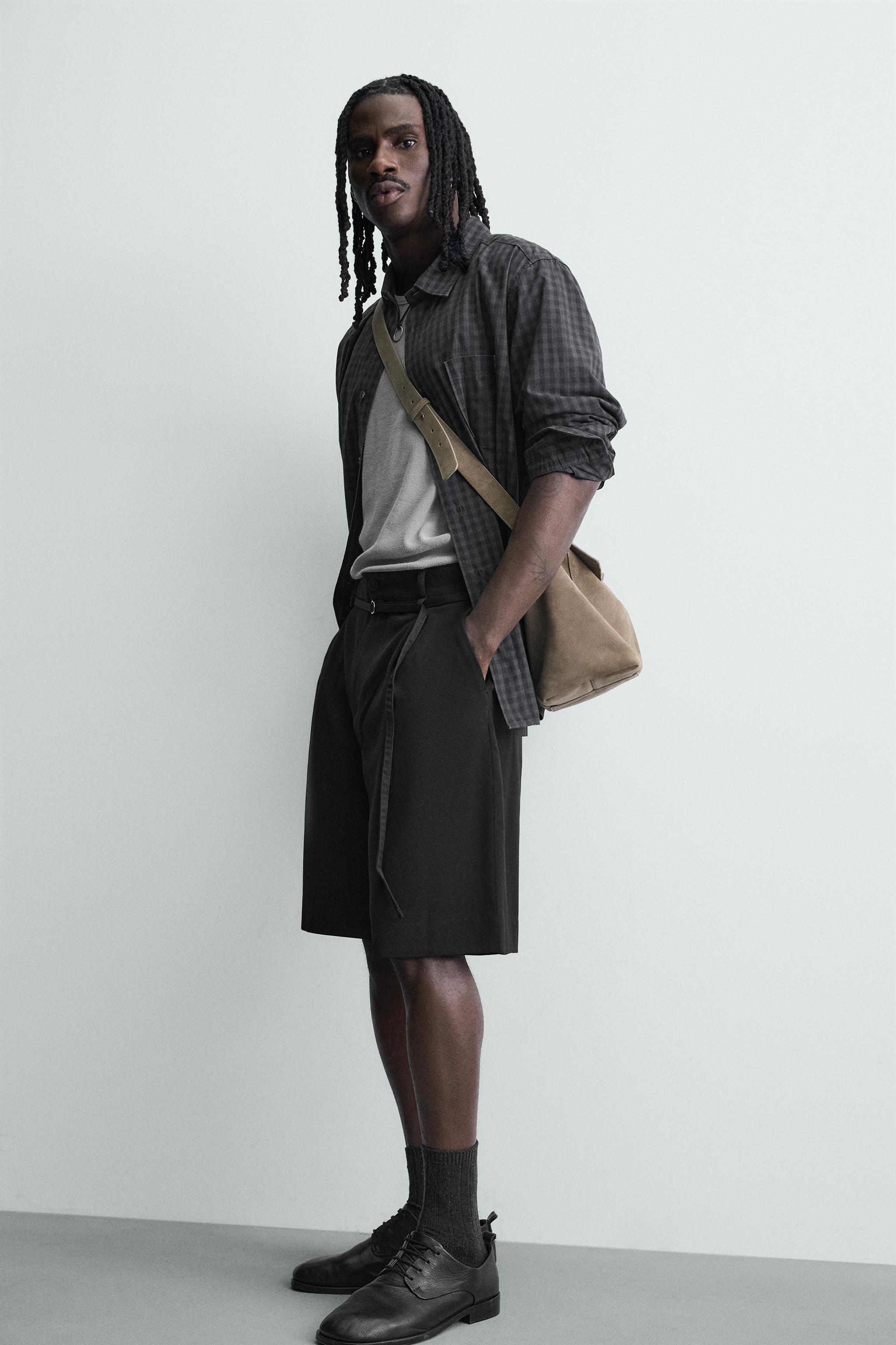BELTED PLEATED RELAXED FIT SHORTS