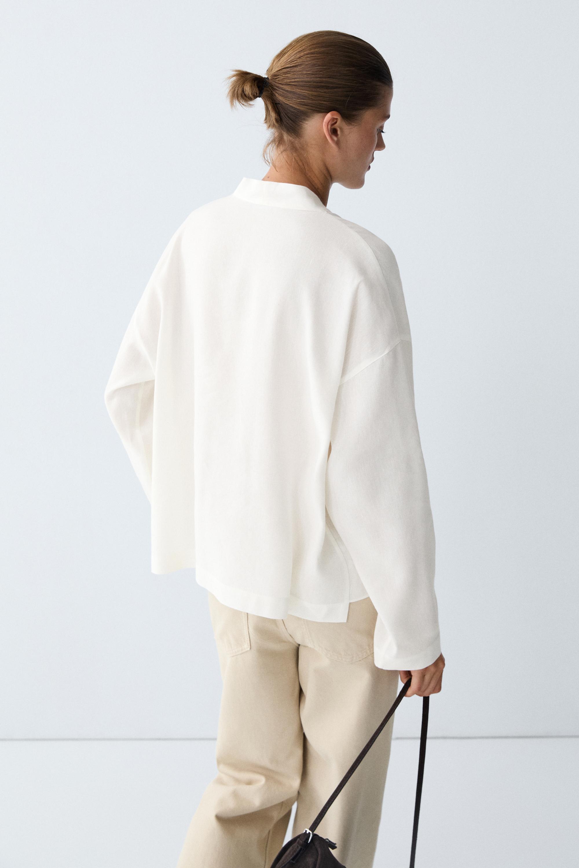 Flowing linen-blend V-neck shirt