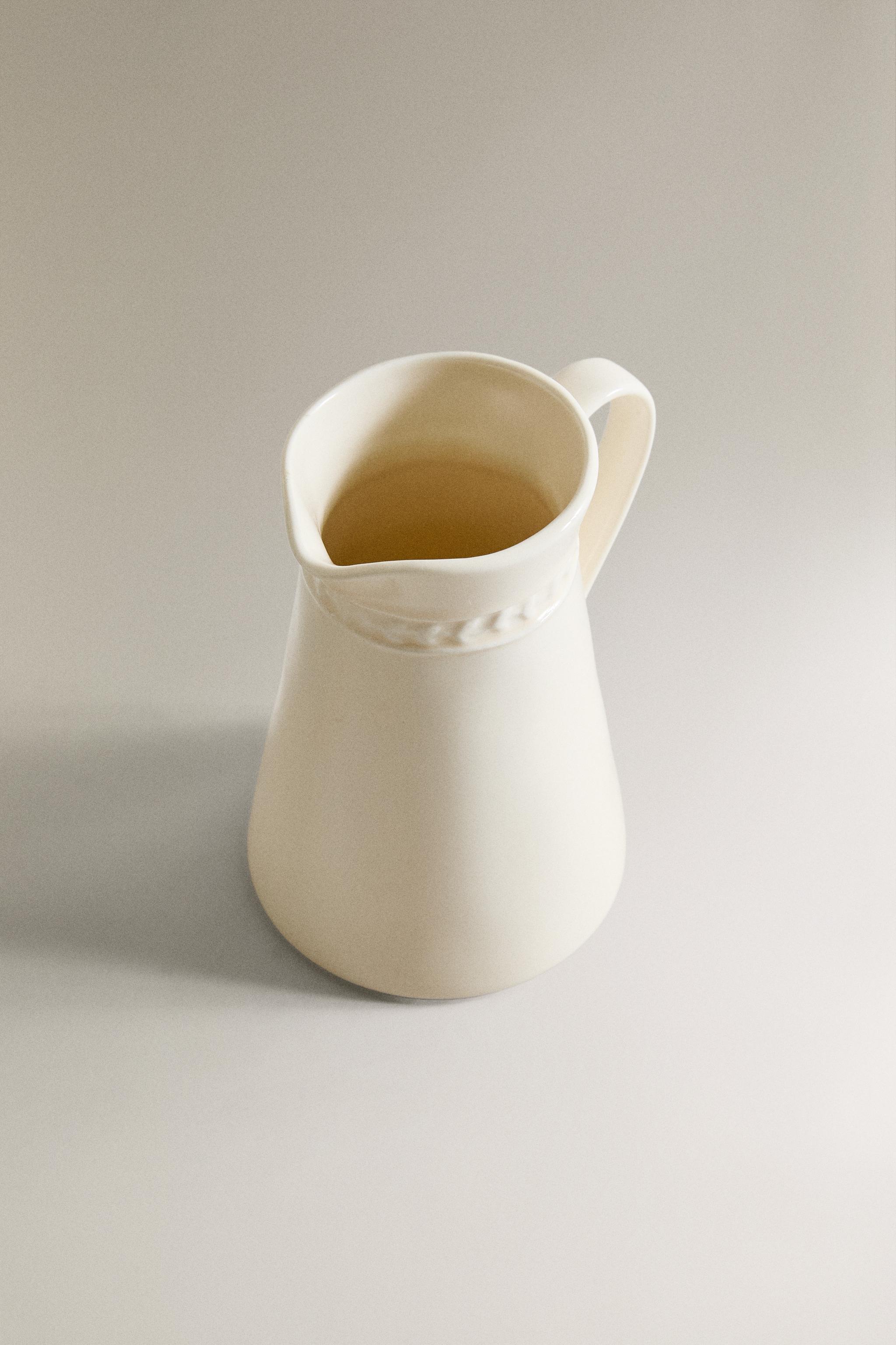 RAISED DESIGN CREAM PITCHER