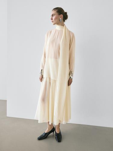 Falda midi fluida vuelo - STUDIO - Crudo de Zara