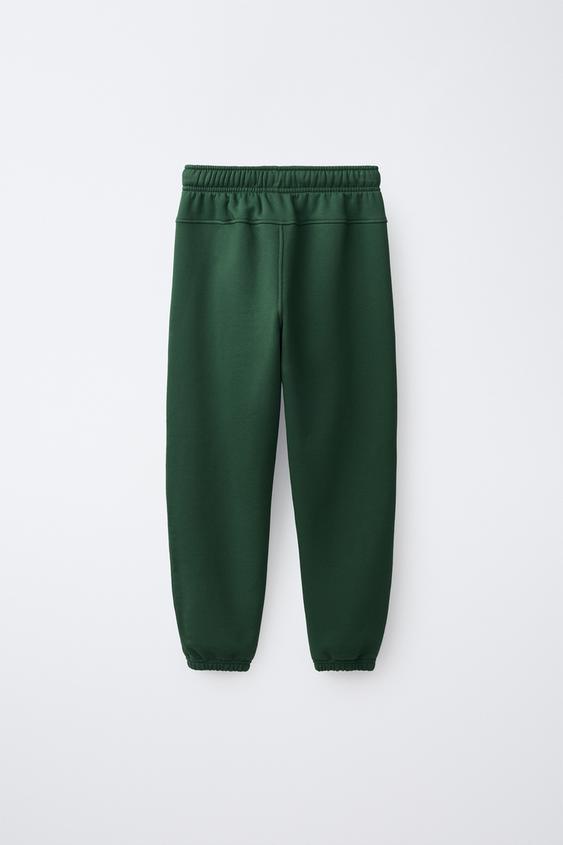 PANTALON DE JOGGING EN MOLLETON UNI AVEC ÉTIQUETTE - Vert bouteille de Zara - Image 1
