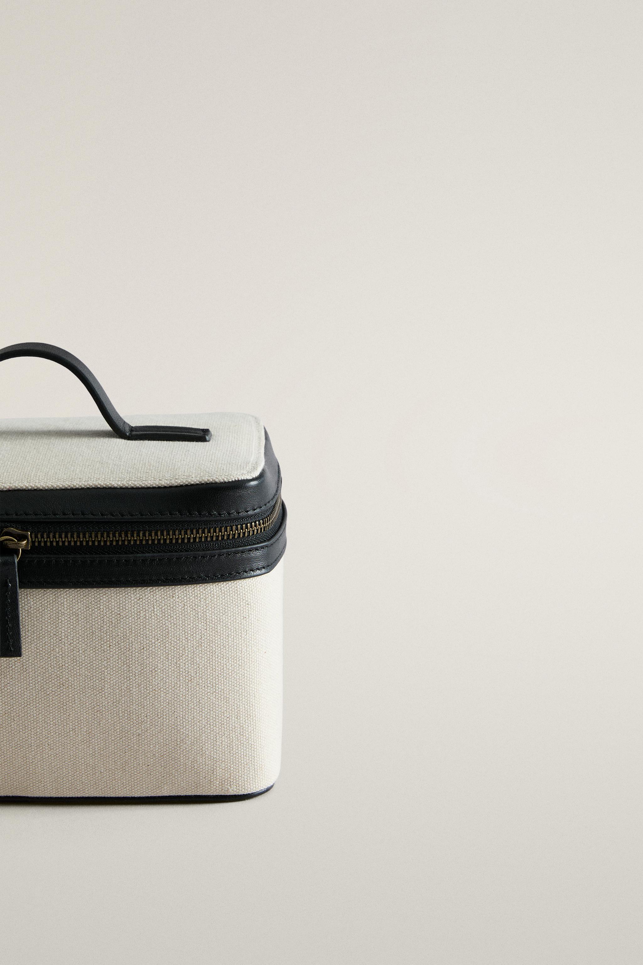 RIGID CANVAS AND LEATHER MAKEUP BAG