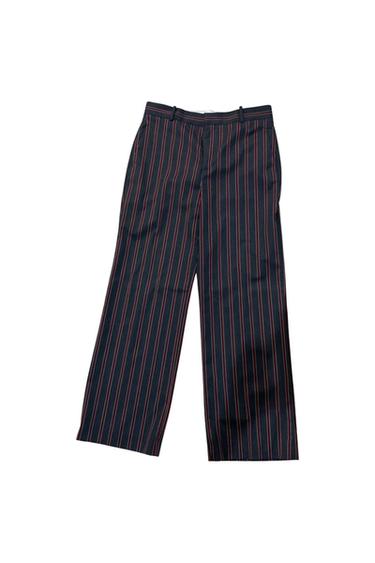 Front view of black and red striped straight-leg pants.