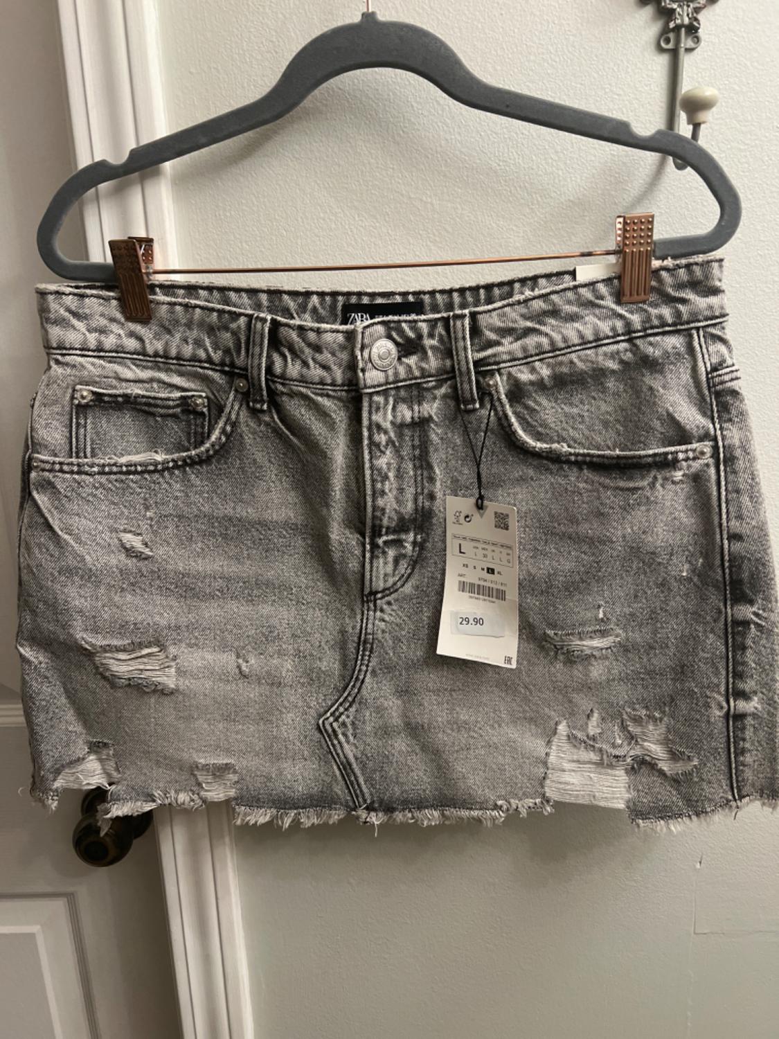 RIPPED DENIM MINI SKIRT