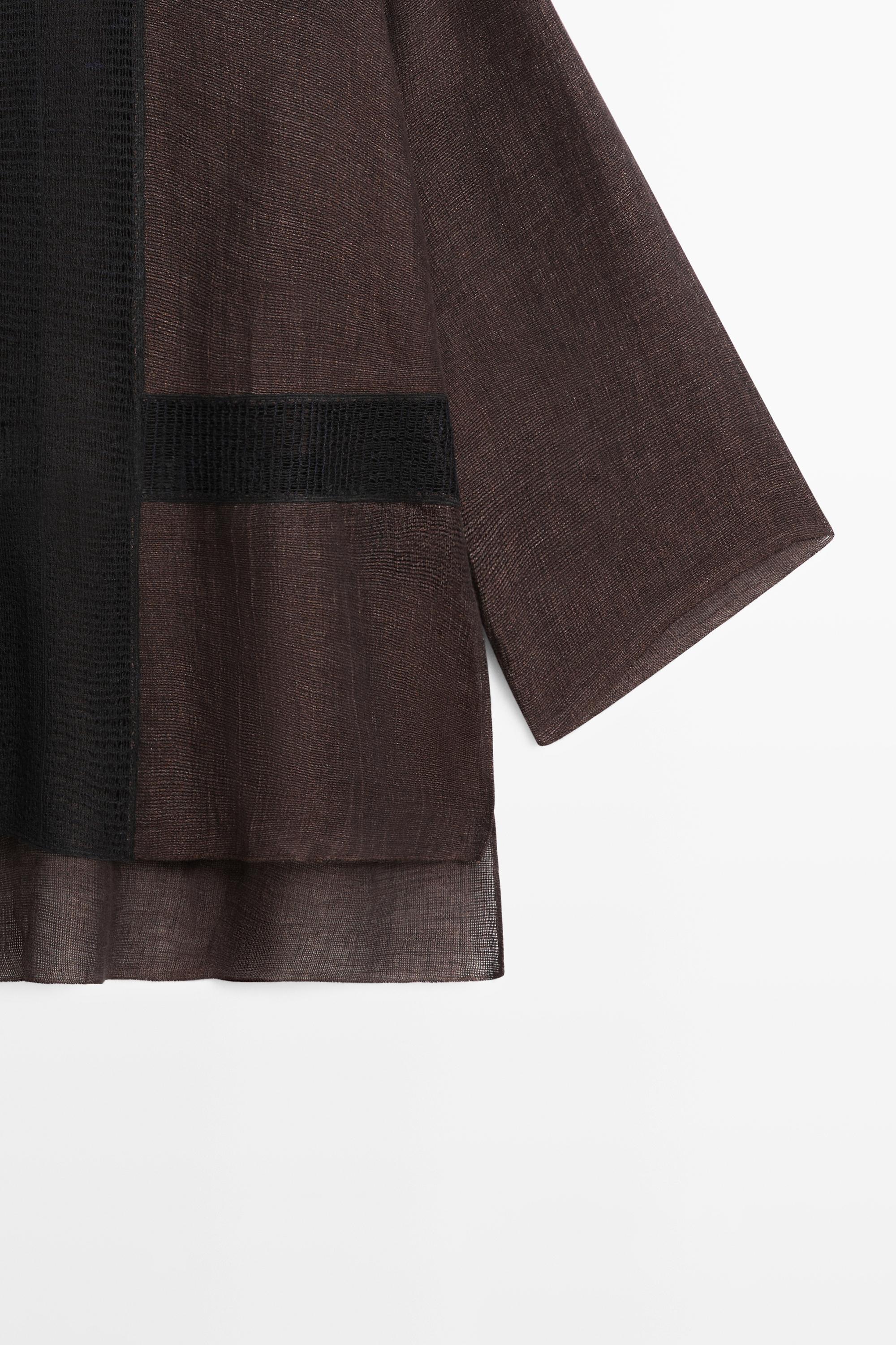 Flowing oversize linen blend blouse with lace trim