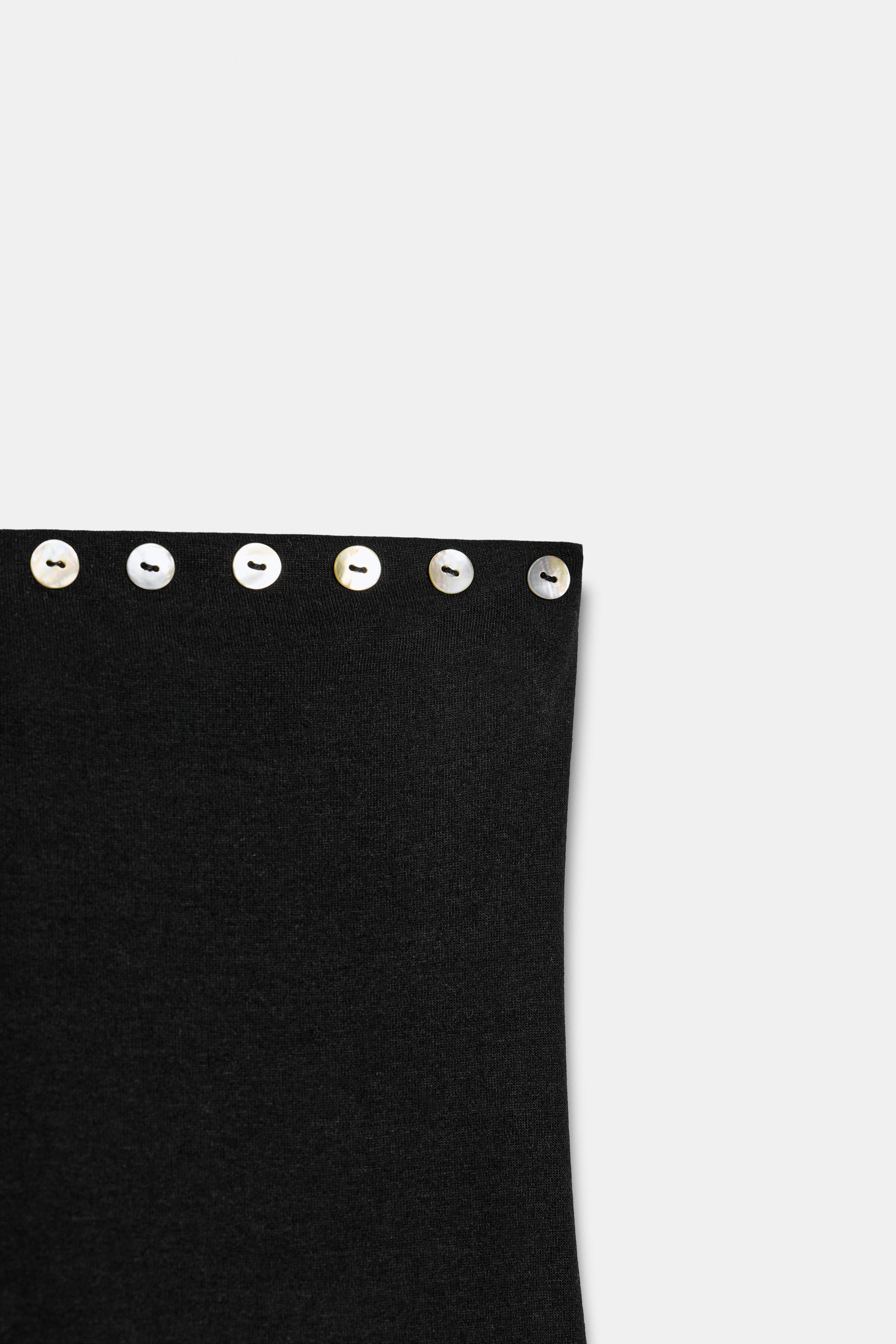 ROBE COURTE À VOLANTS