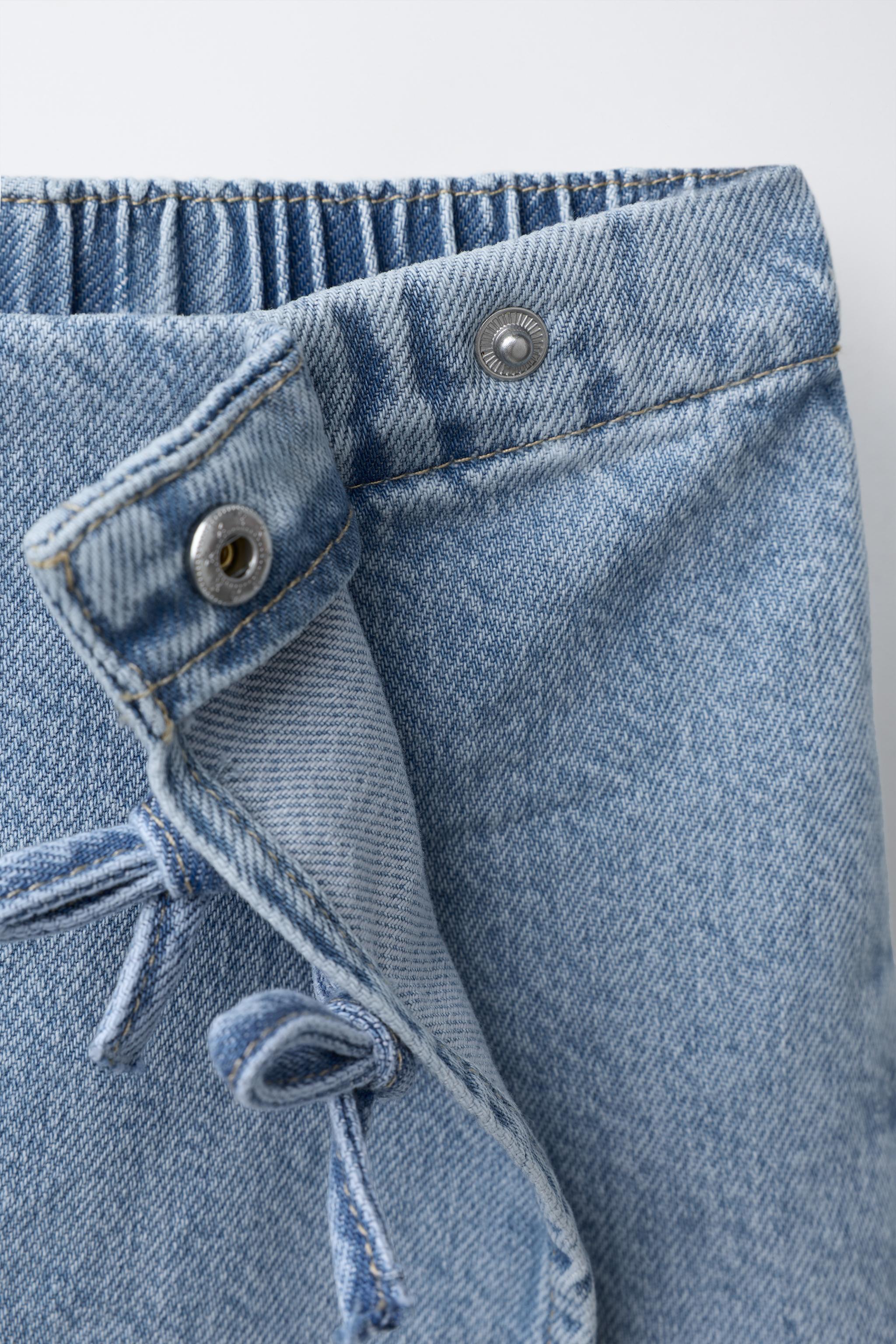 JUPE-SHORT EN JEAN AVEC NŒUDS