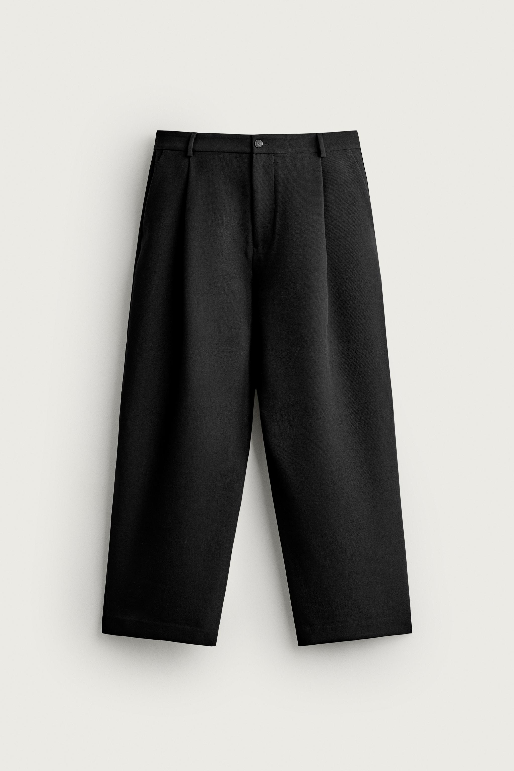 RELAXED FIT PLEATED PANTS — Black