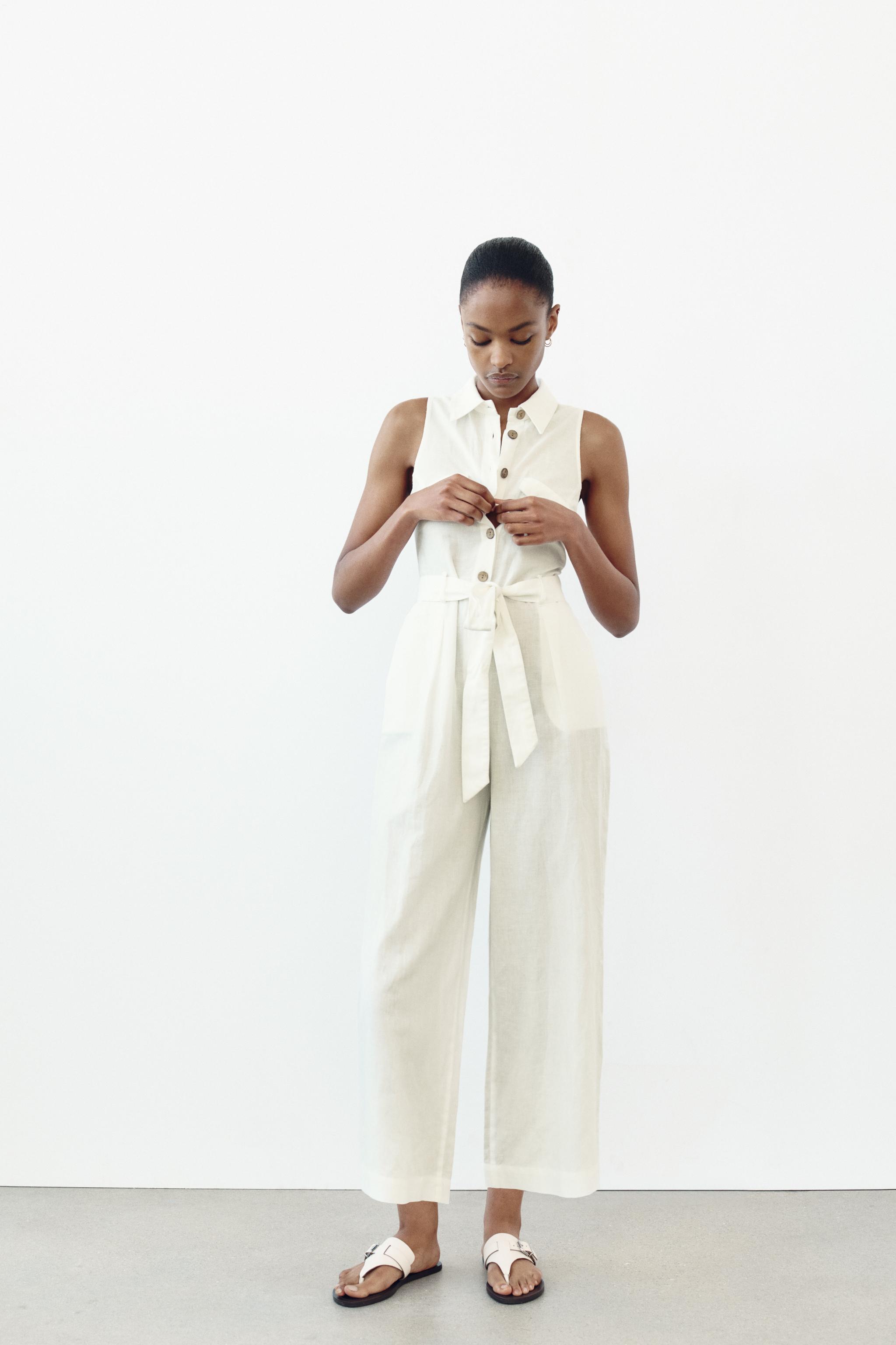 Jumpsuit with pockets zara on sale