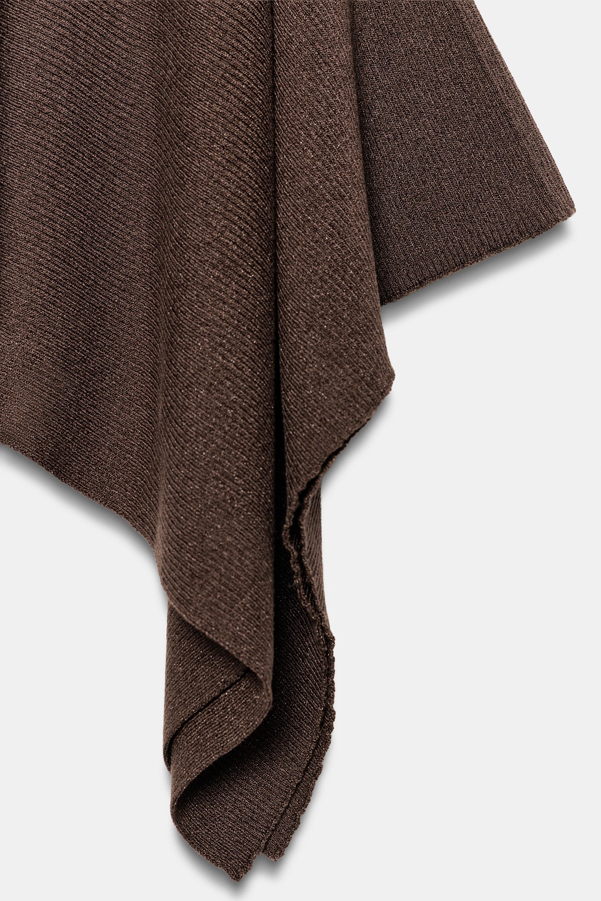 ASYMMETRIC KNIT MIDI SKIRT