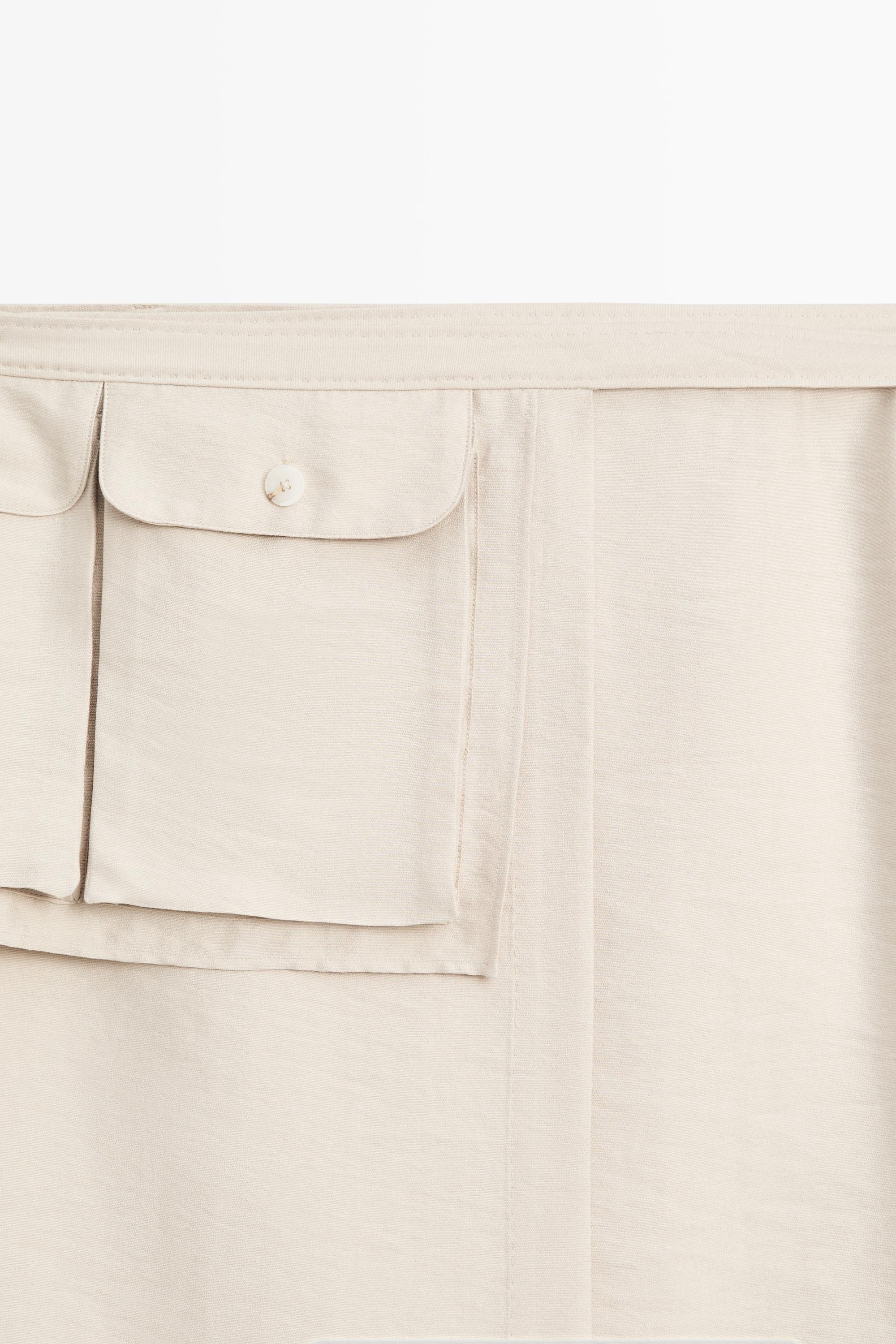 Fluid pocket-detail skirt - STUDIO
