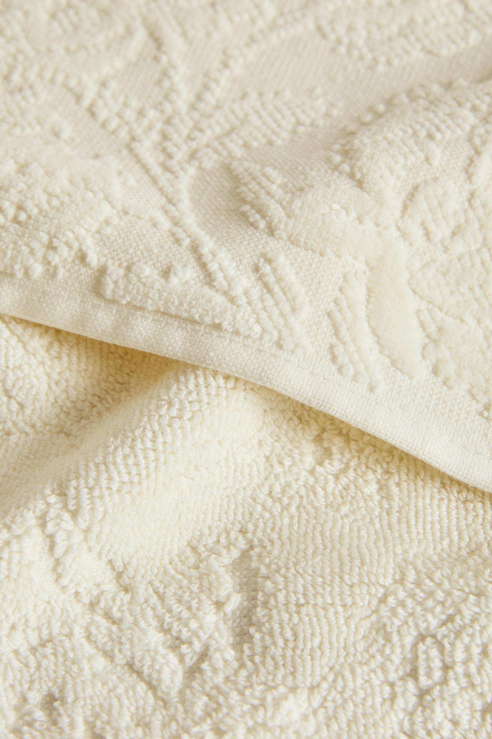 SERVIETTE DE BAIN JACQUARD FLORAL
