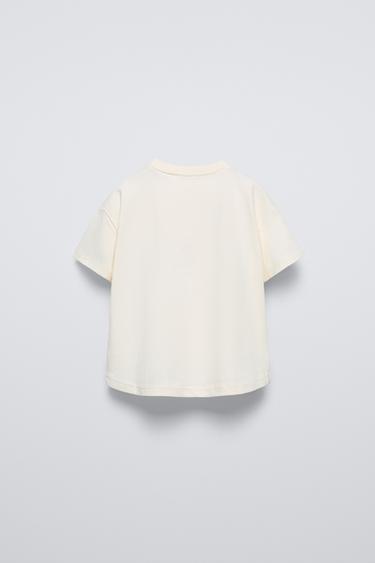 T-SHIRT IMPRIMÉ BRILLANT - Écru de Zara - Image 1