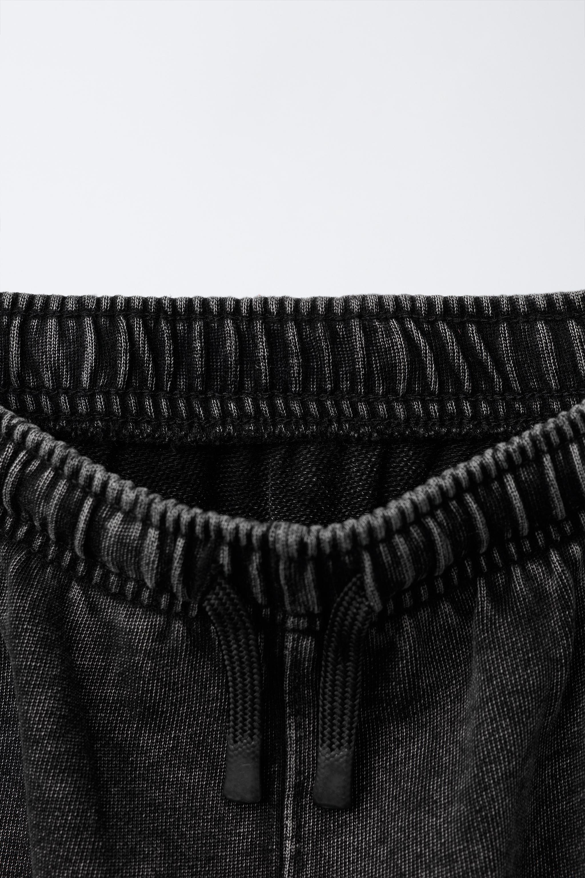 SLIM FIT PANTS WITH ZIPPERS