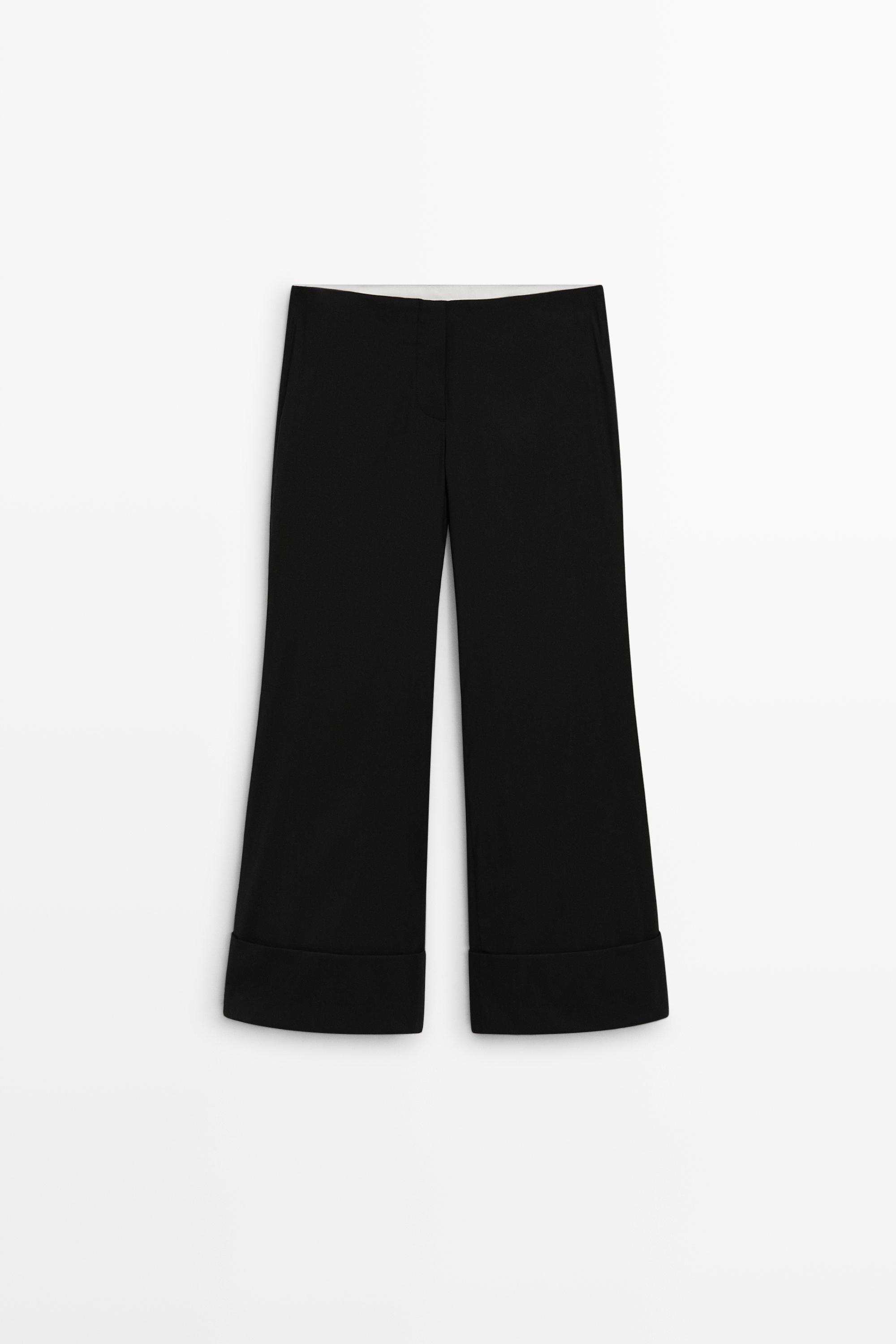 Flare fit pants with hem detail