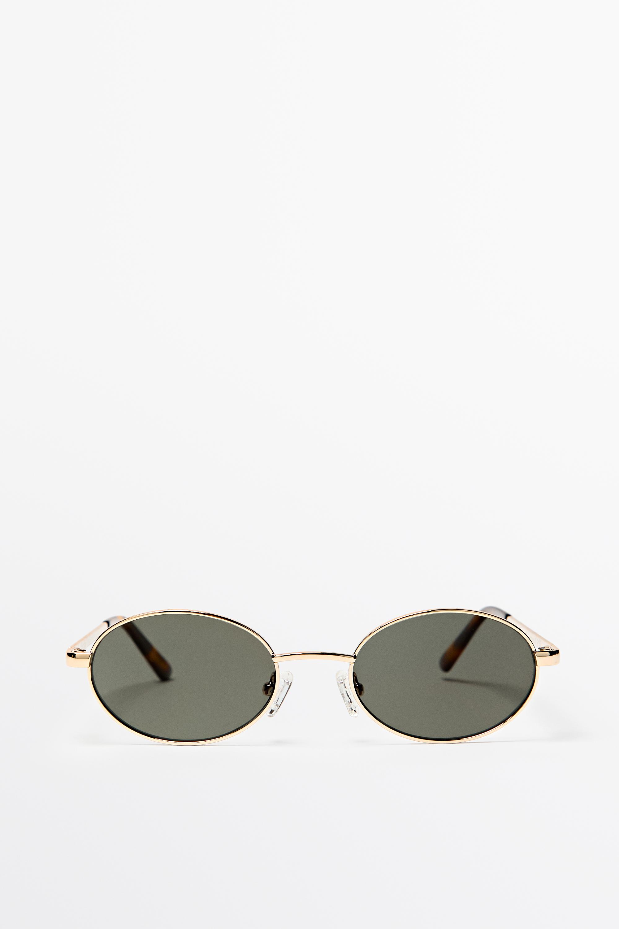 Oval metal sunglasses — Golden
