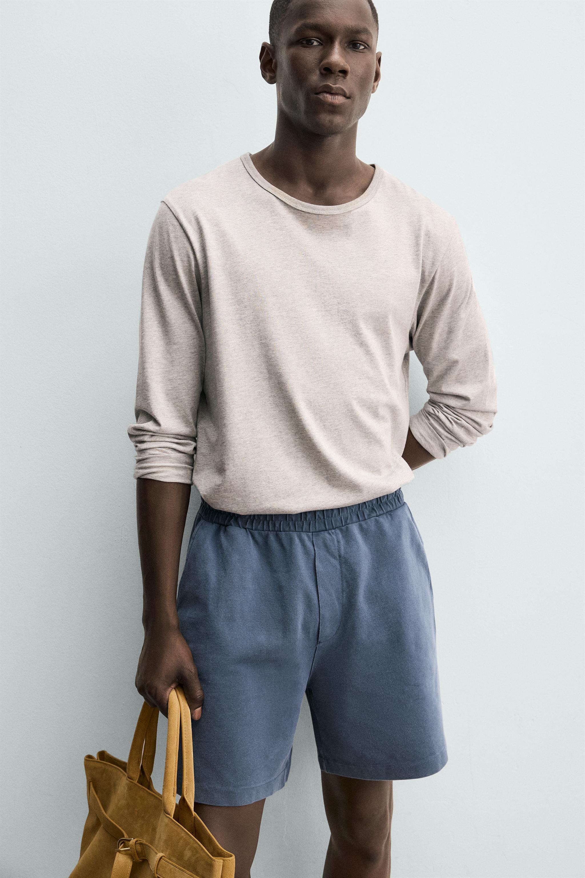 BERMUDA EN PIQUÉ REGULAR FIT DÉLAVÉ