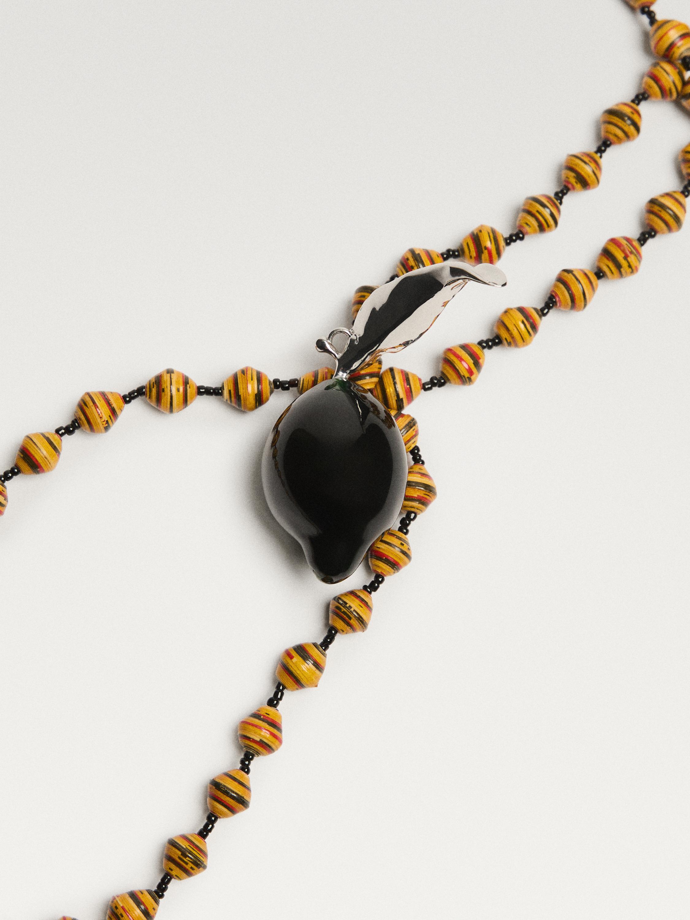 Pendant with glass lemon piece