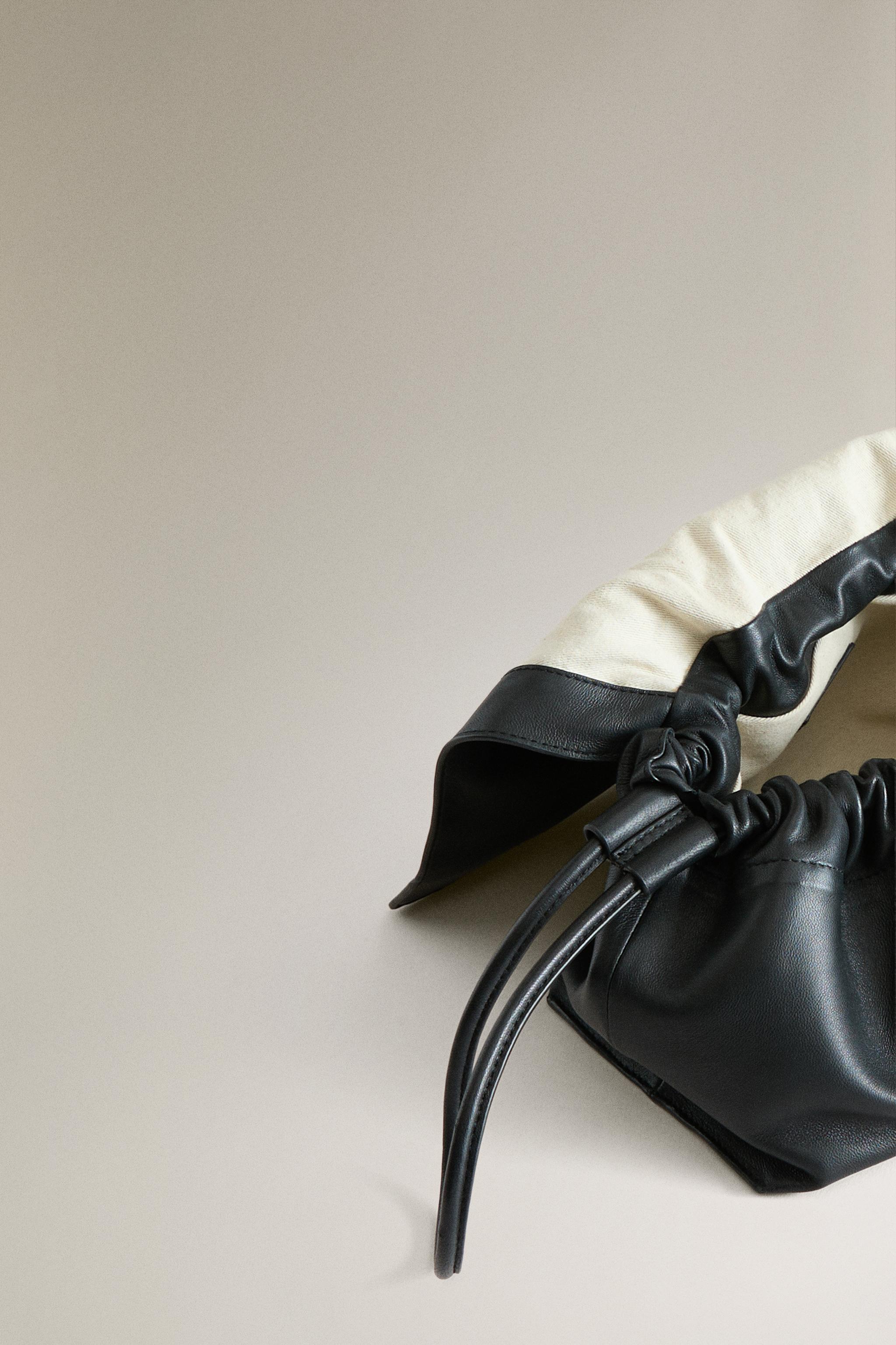 TROUSSE DE TOILETTE POCHETTE CUIR