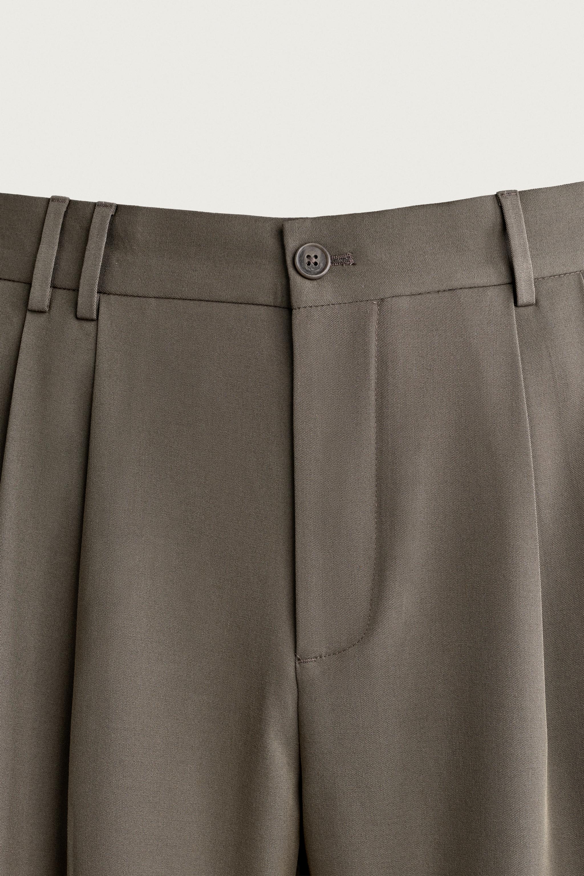 PLEATED WIDE-FIT PANTS