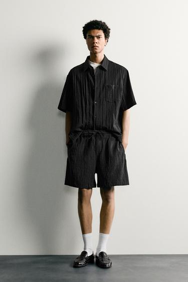 TEXTURED RELAXED FIT BERMUDA SHORTS - Black by Zara