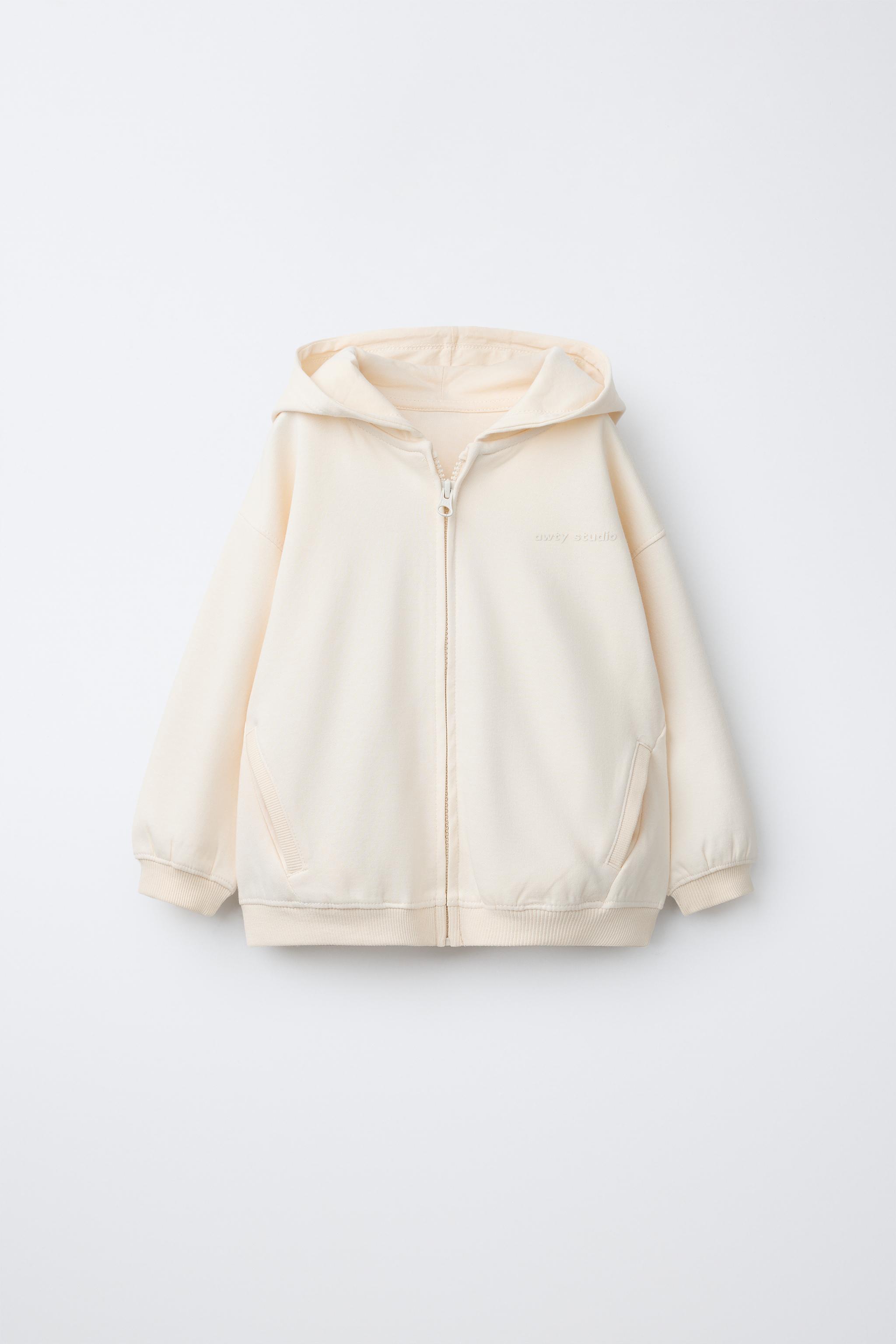 INTERLOCK ZIP SWEATSHIRT WITH RAISED TEXT