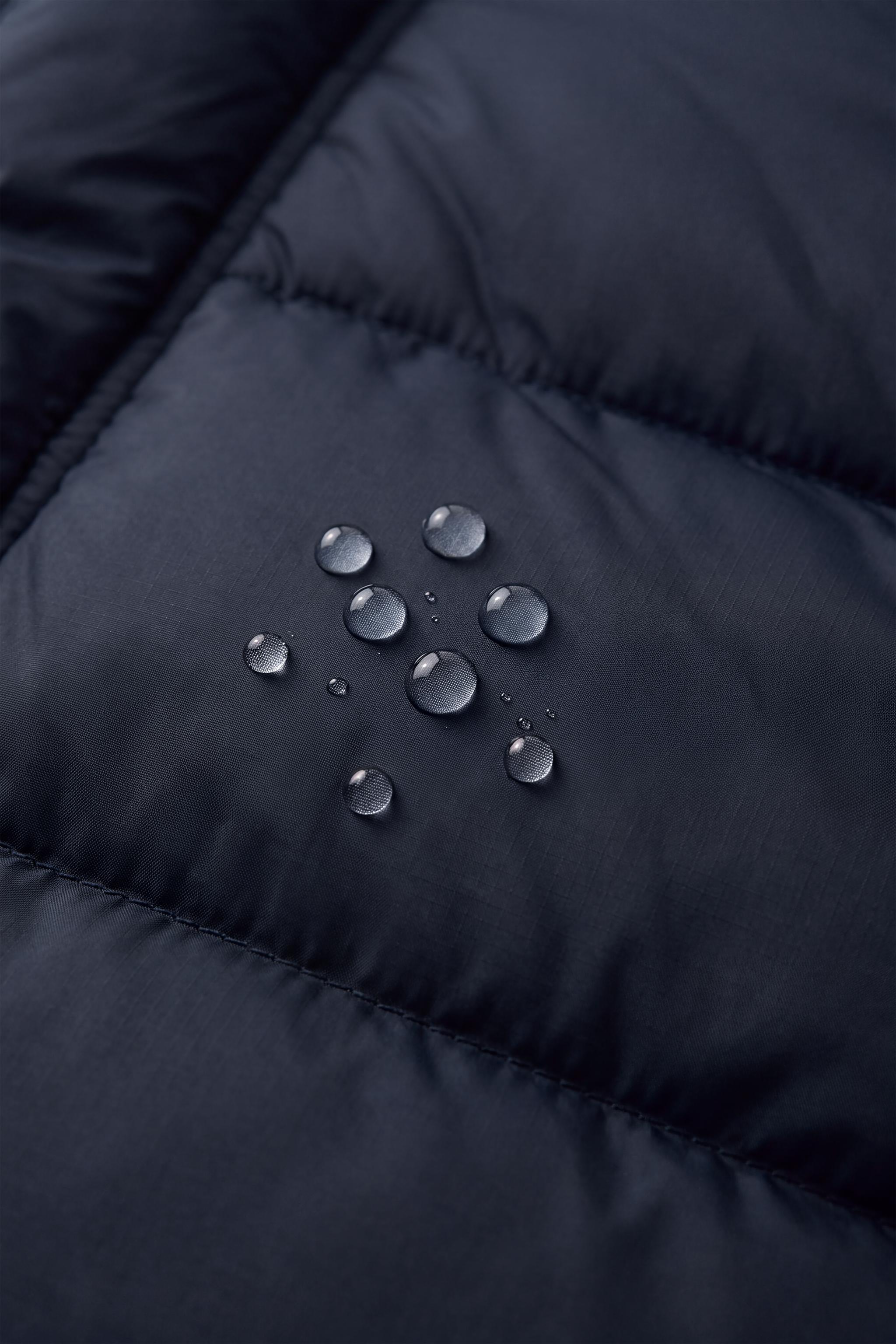 MANTEAU MATELASSÉ À CAPUCHE DÉPERLANT