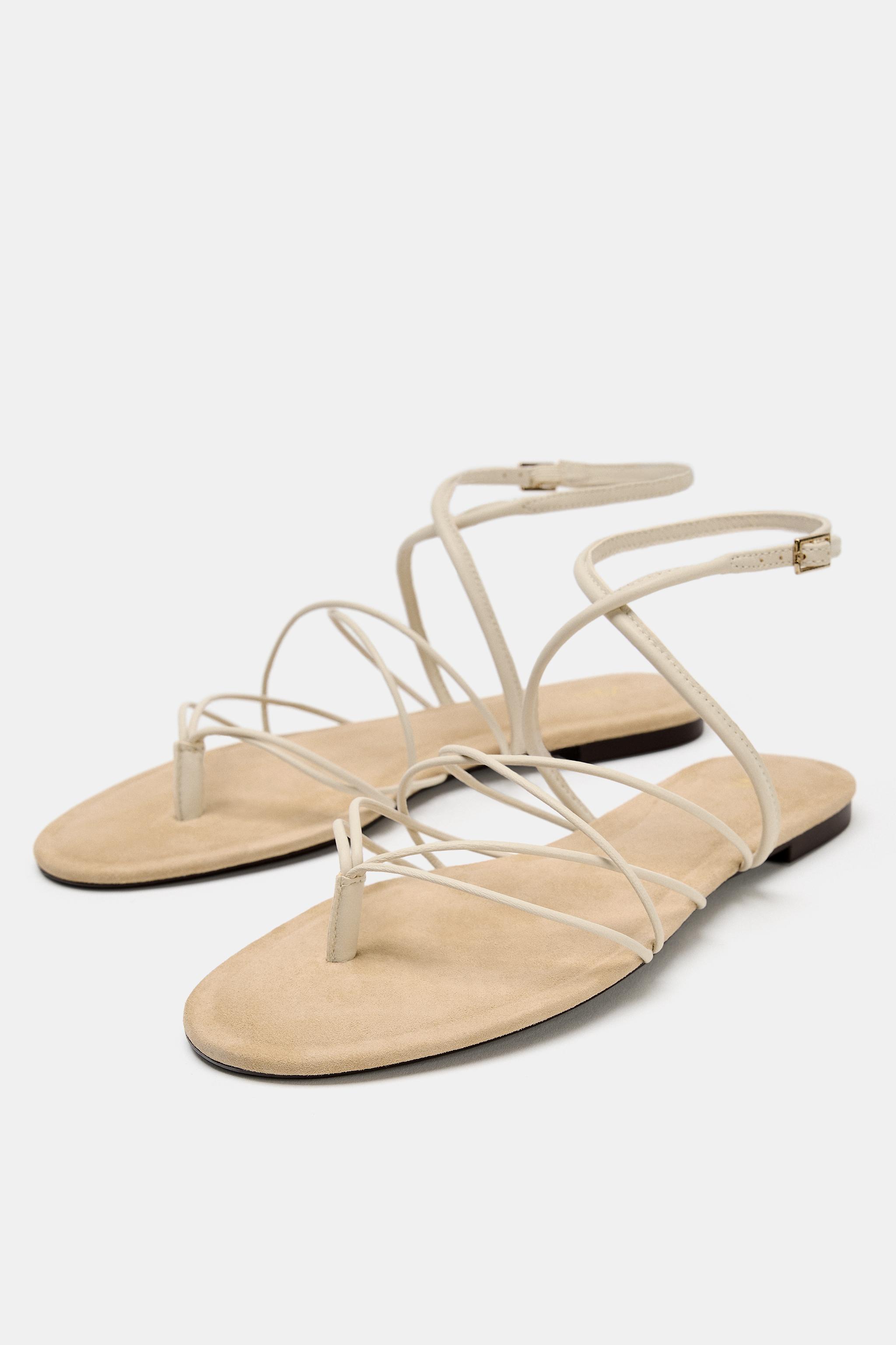 STRAPPY LEATHER FLAT SANDALS