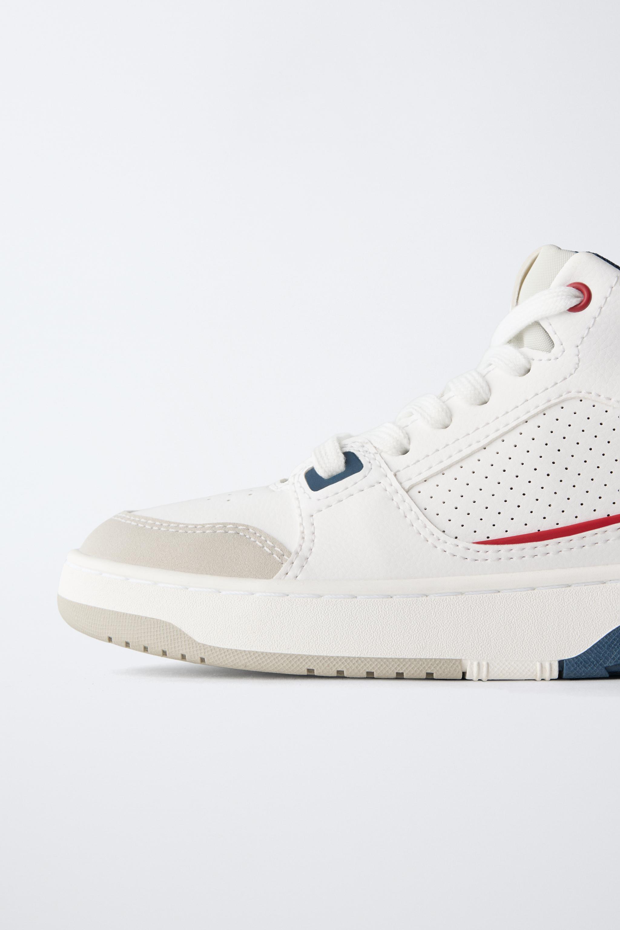 PIECED HIGH TOP SNEAKERS