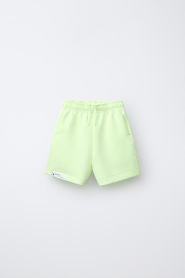 BERMUDA SPORTY NEOPRENO FLÚOR - Lima flúor de Zara