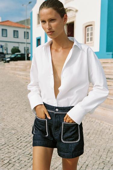 SHORTS Z1975 DENIM بسرج عالٍ وغرزات راجعة - أزرق الخاص بـ Zara