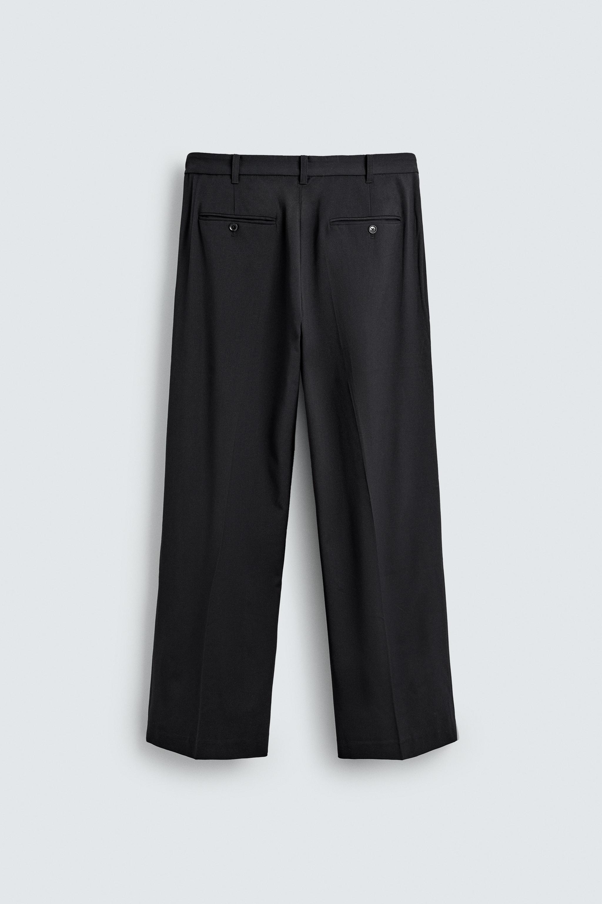 TEXTURED PLEATED PANTS