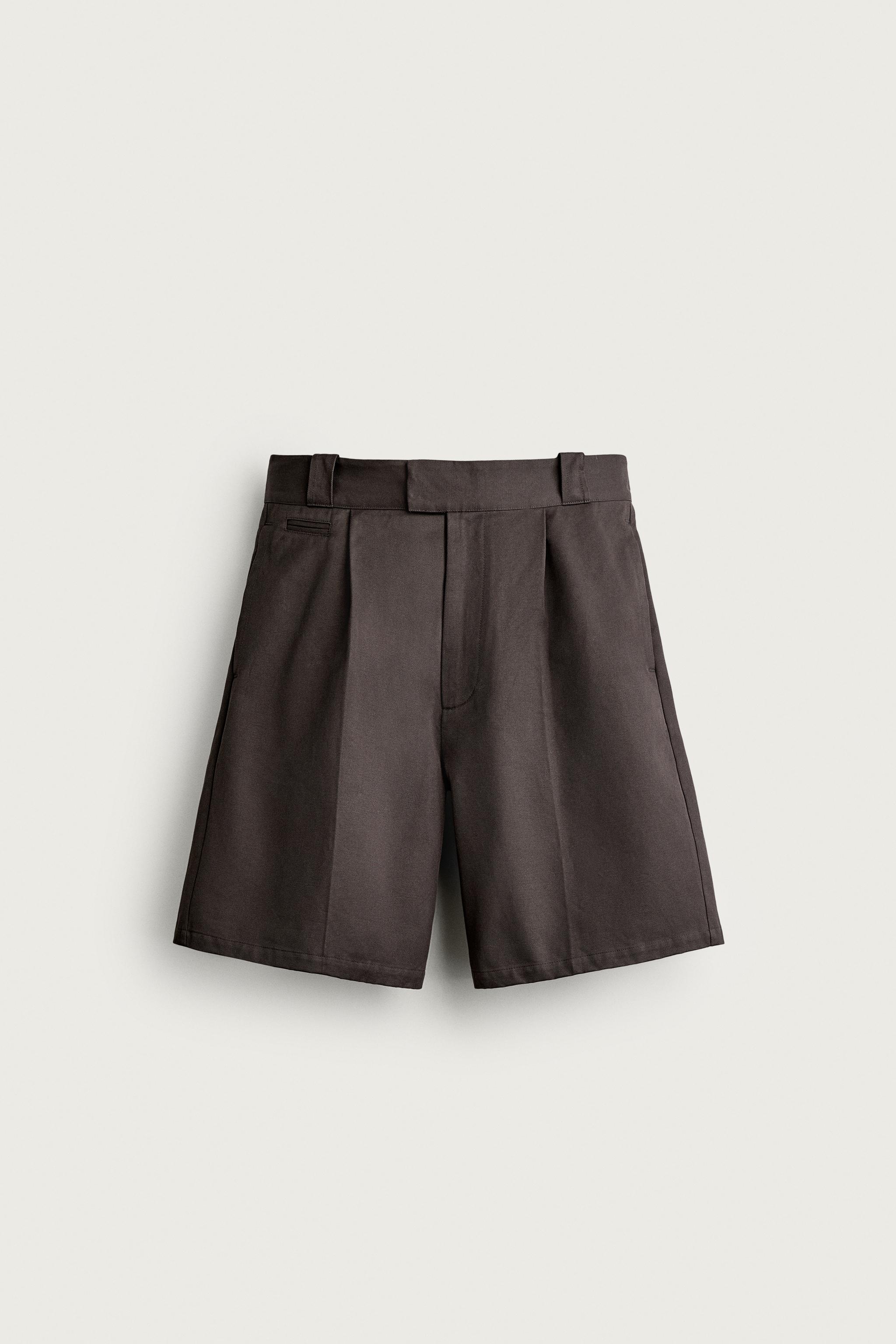 RELAXED FIT PLEATED SHORTS