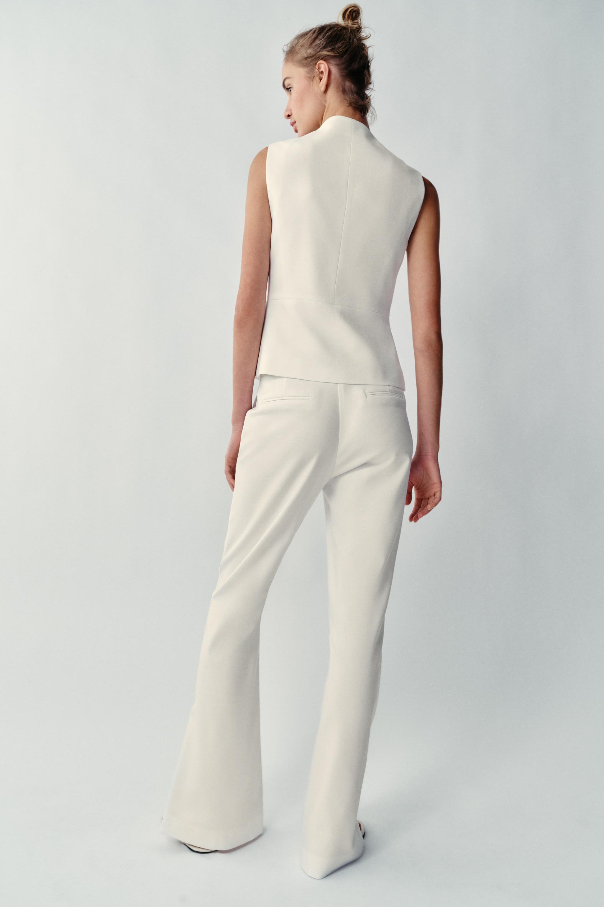 PANTS WITH SLIT HEMS