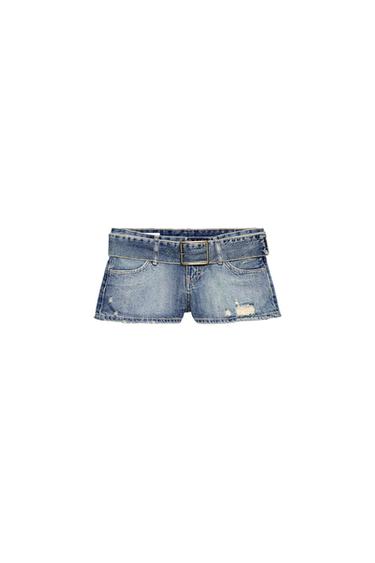 Front view of blue denim shorts with a wide belt, low rise, front pockets, and distressed detailing.