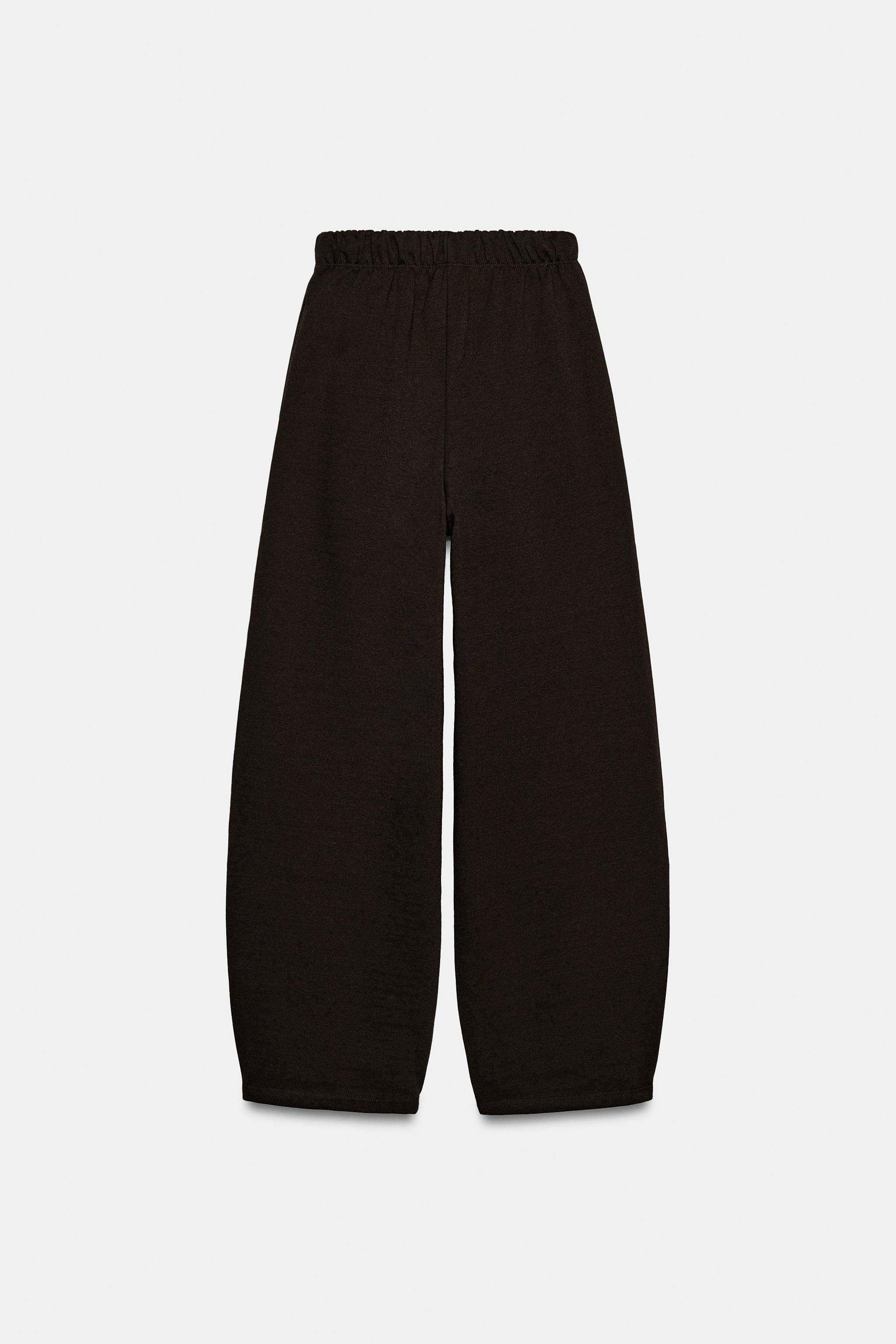 PANTALON EN MOLLETON AVEC PIÈCE