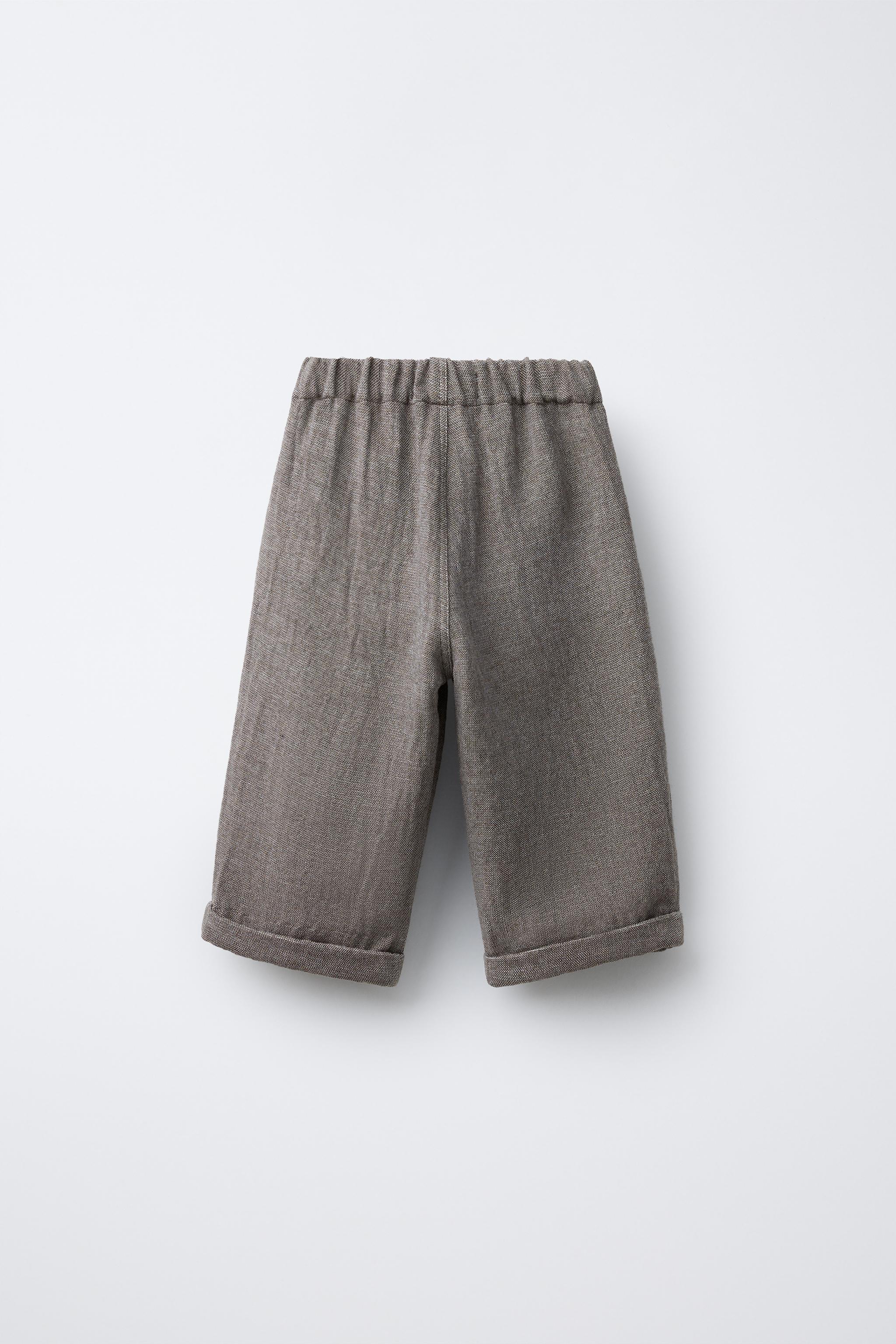 RUSTIC BAGGY PANTS WITH BUTTONS