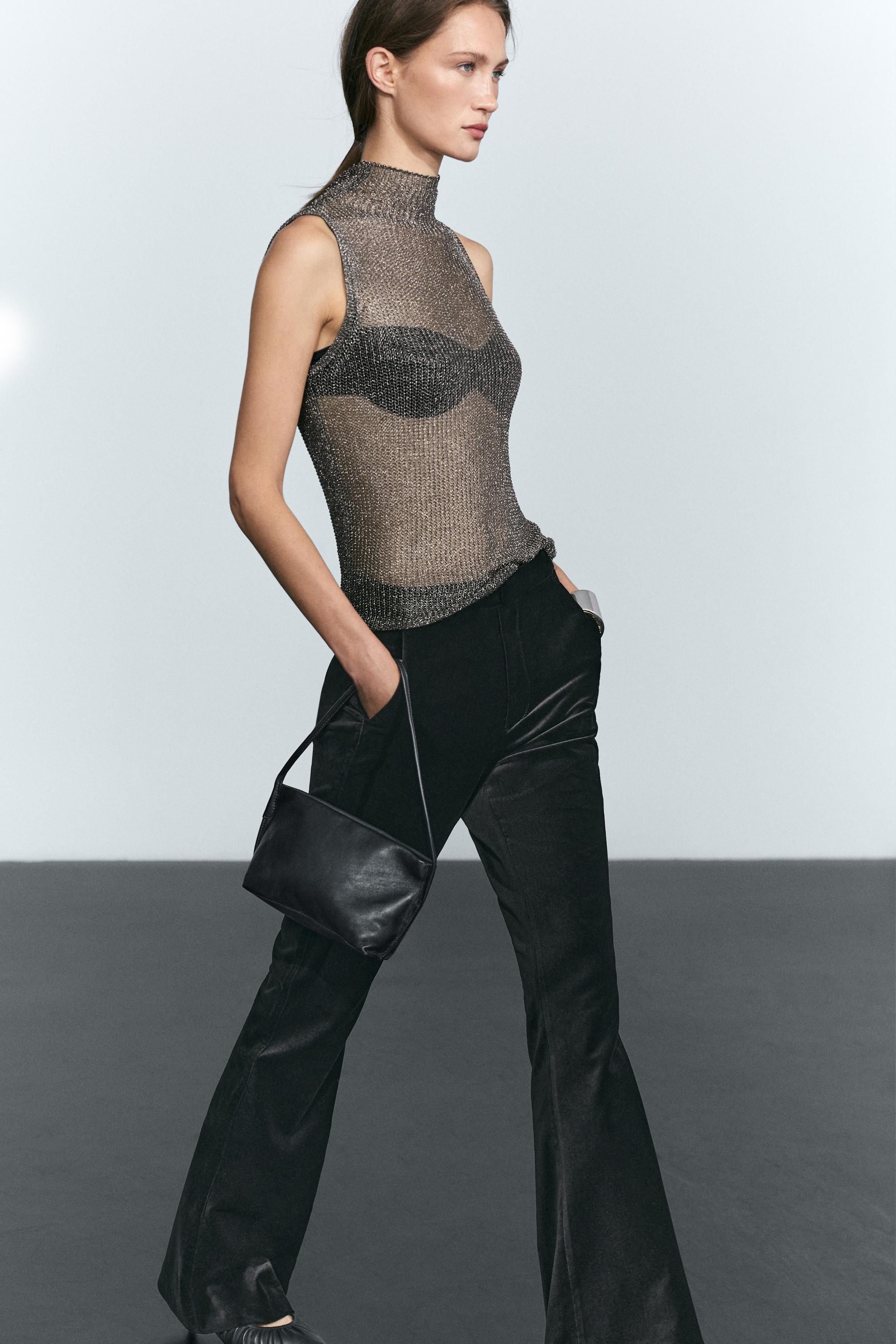 Metallic detail mock turtleneck top
