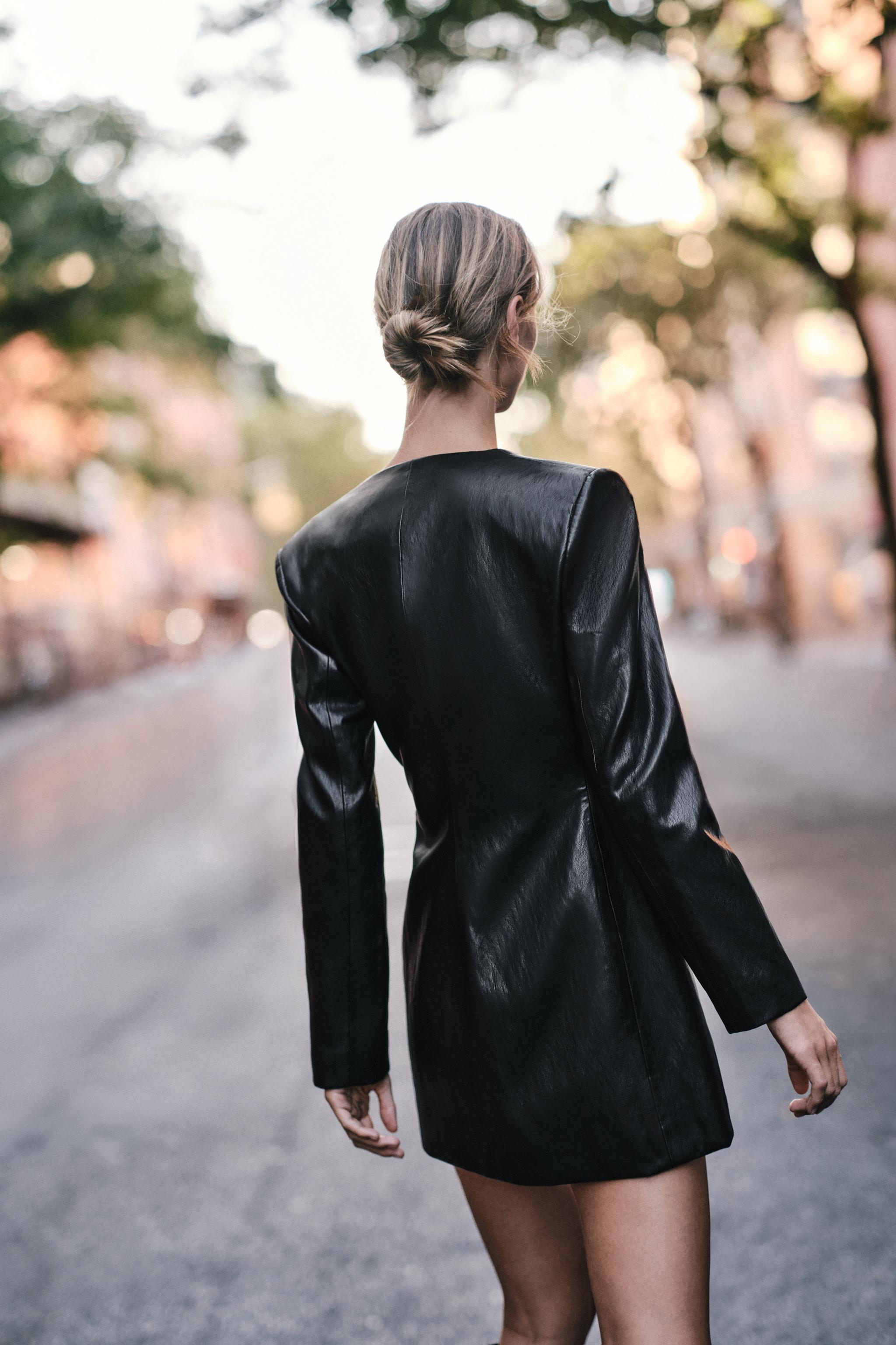 FAUX-LEATHER EFFECT DRESS WITH GOLD APPLIQUÉ