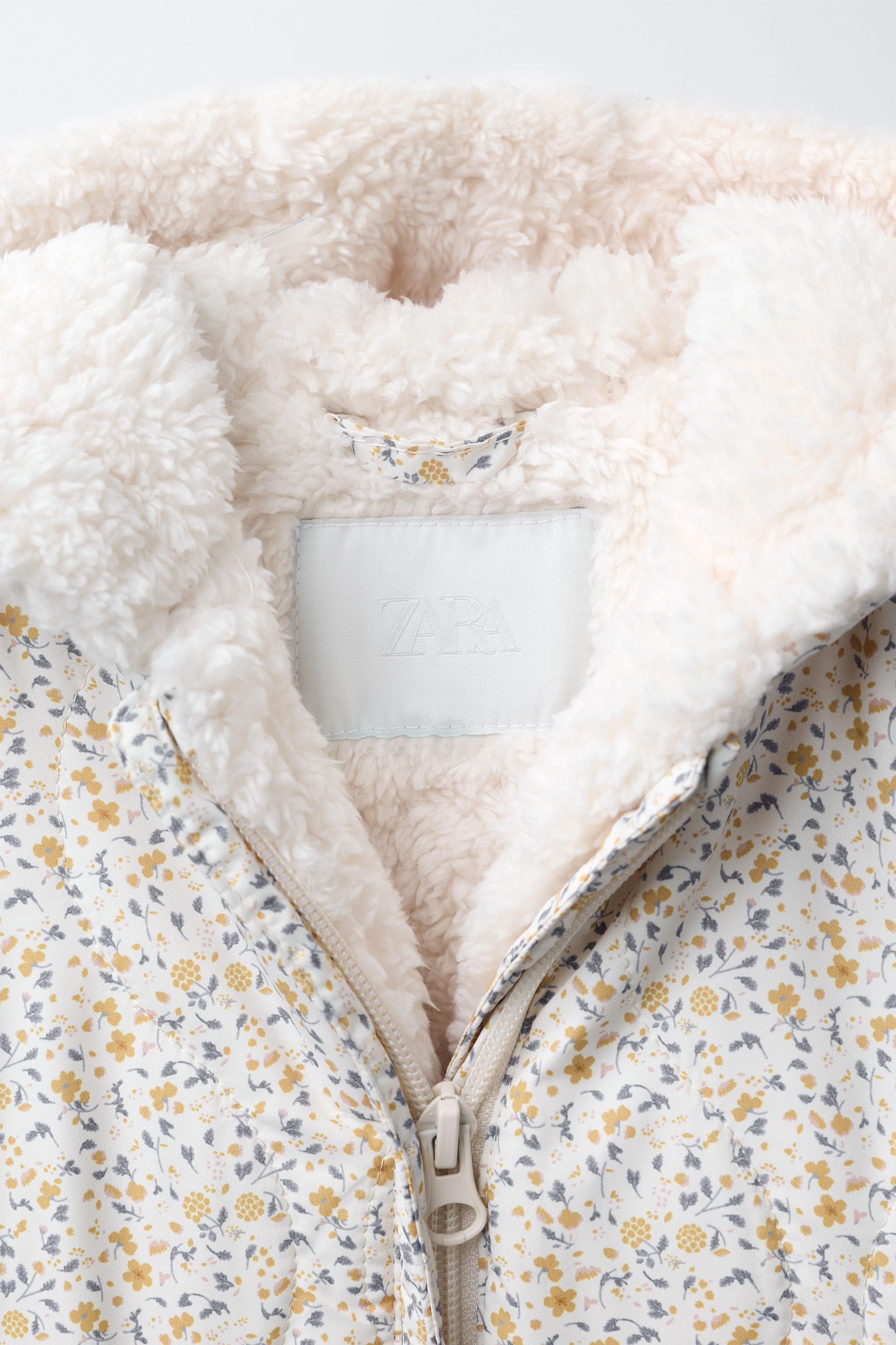 NYLON ROMPER WITH DETACHABLE MITTENS AND BOOTIES, FLORAL PRINT