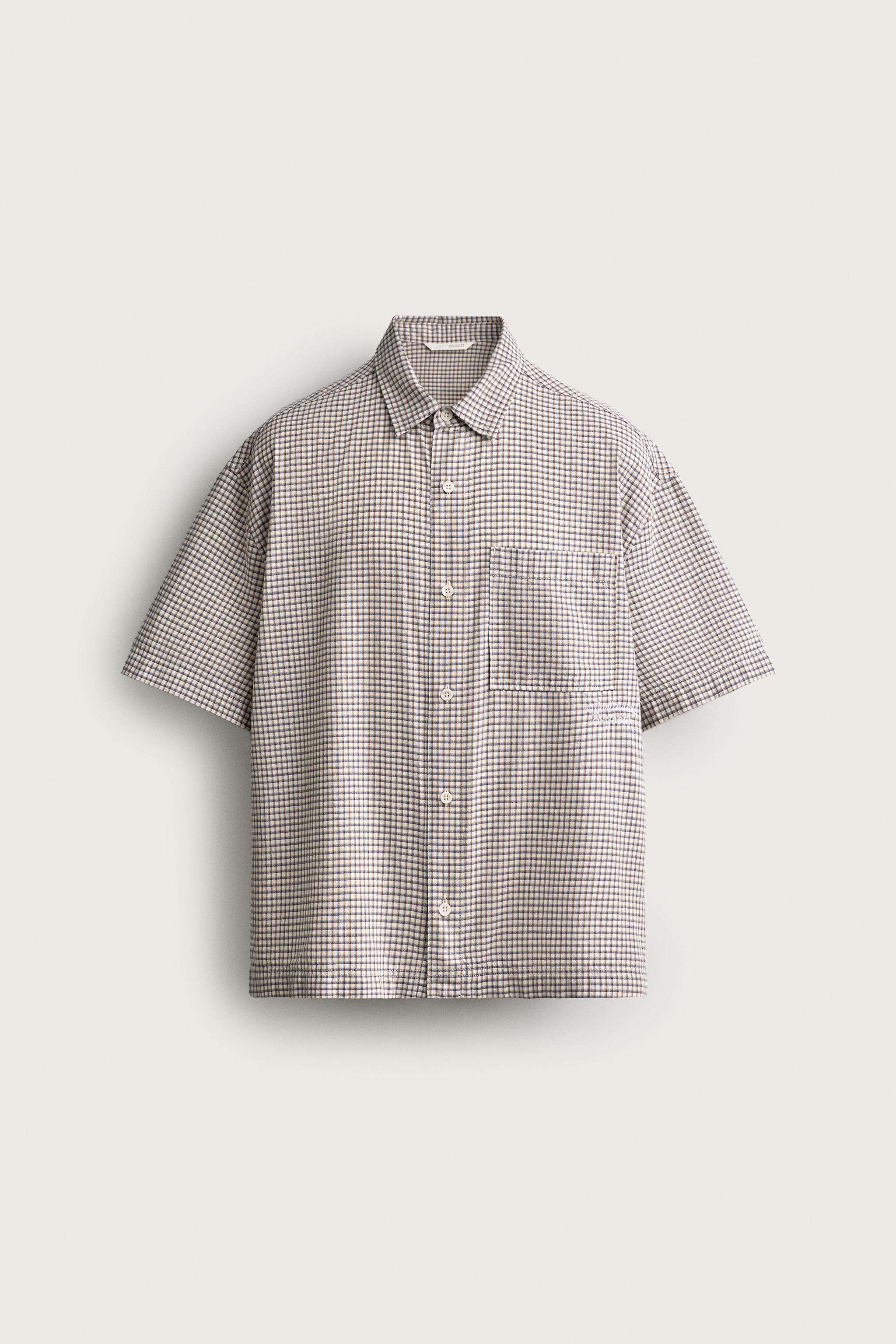 RELAXED FIT PLAID TEXT SHIRT — Blue